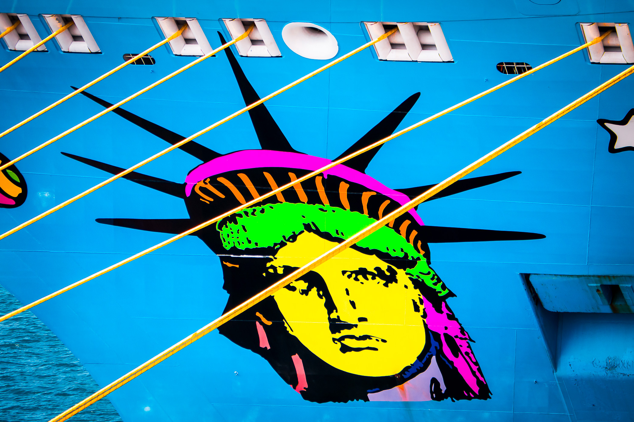 The stylized Statue of Liberty graphic that graces the bow of the cruise ship Norwegian Breakaway, spotted docked in Nassau, Bahamas.