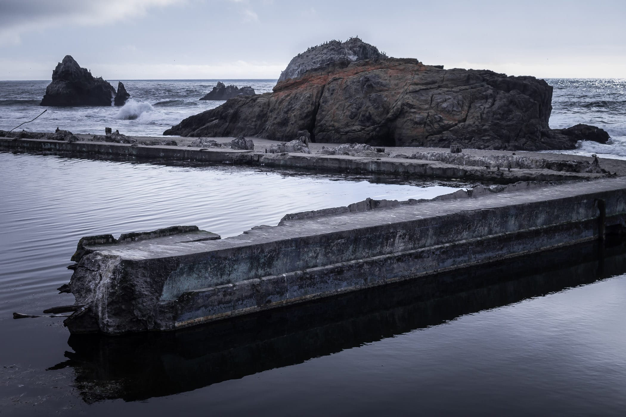 The ruins of San Francisco’s Sutro Baths, once the world’s largest indoor swimming pool, lie along the beach at Lands End.