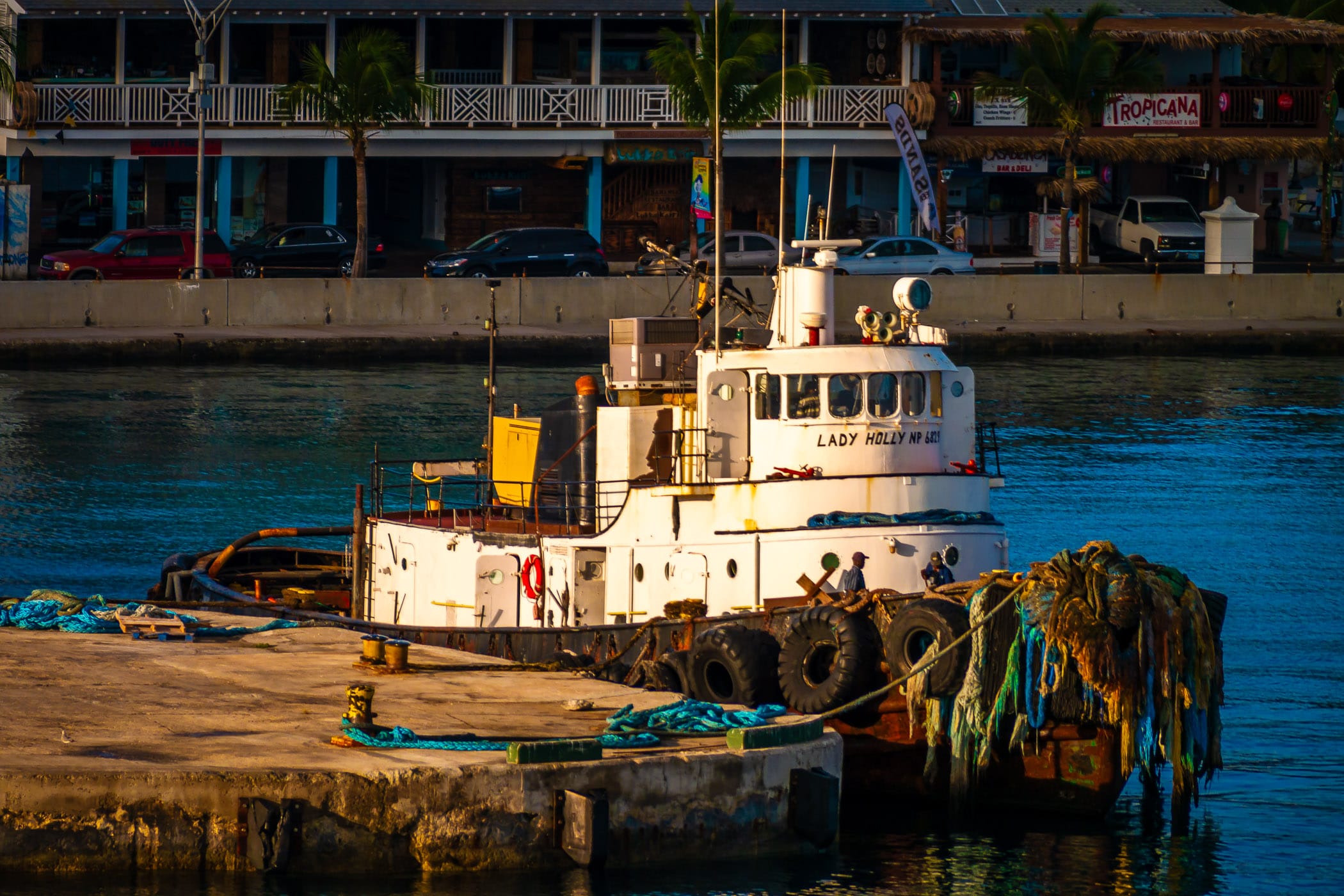 An old tugboat readies to go to work for the day in the harbour at Nassau, Bahamas.