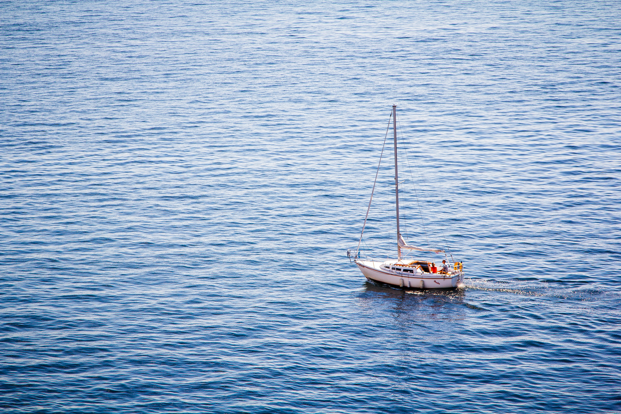 A sailboat cruises Puget Sound just north of Seattle.