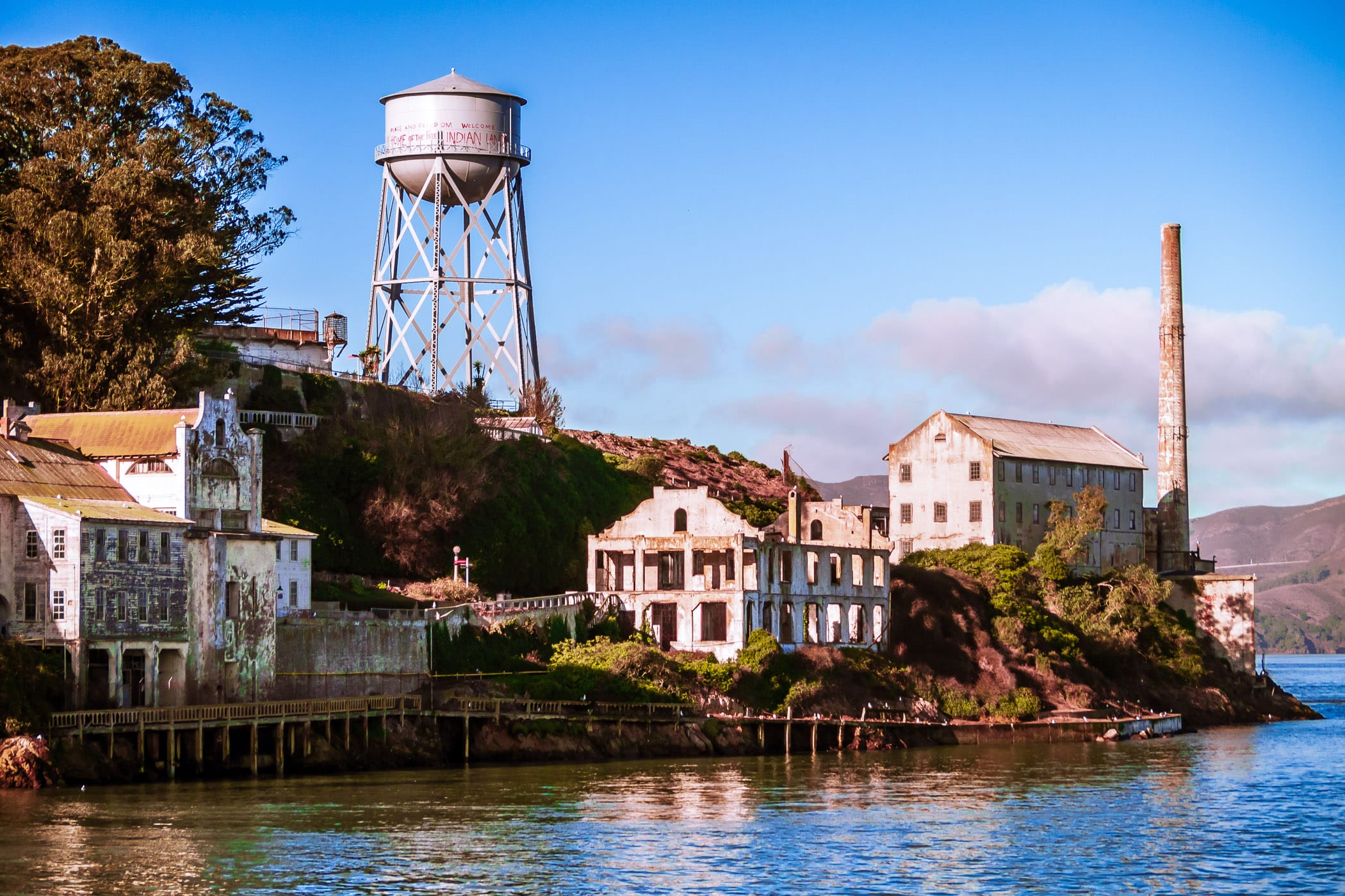 The ruins of Alcatraz Federal Penitentiary rise from San Francisco Bay.