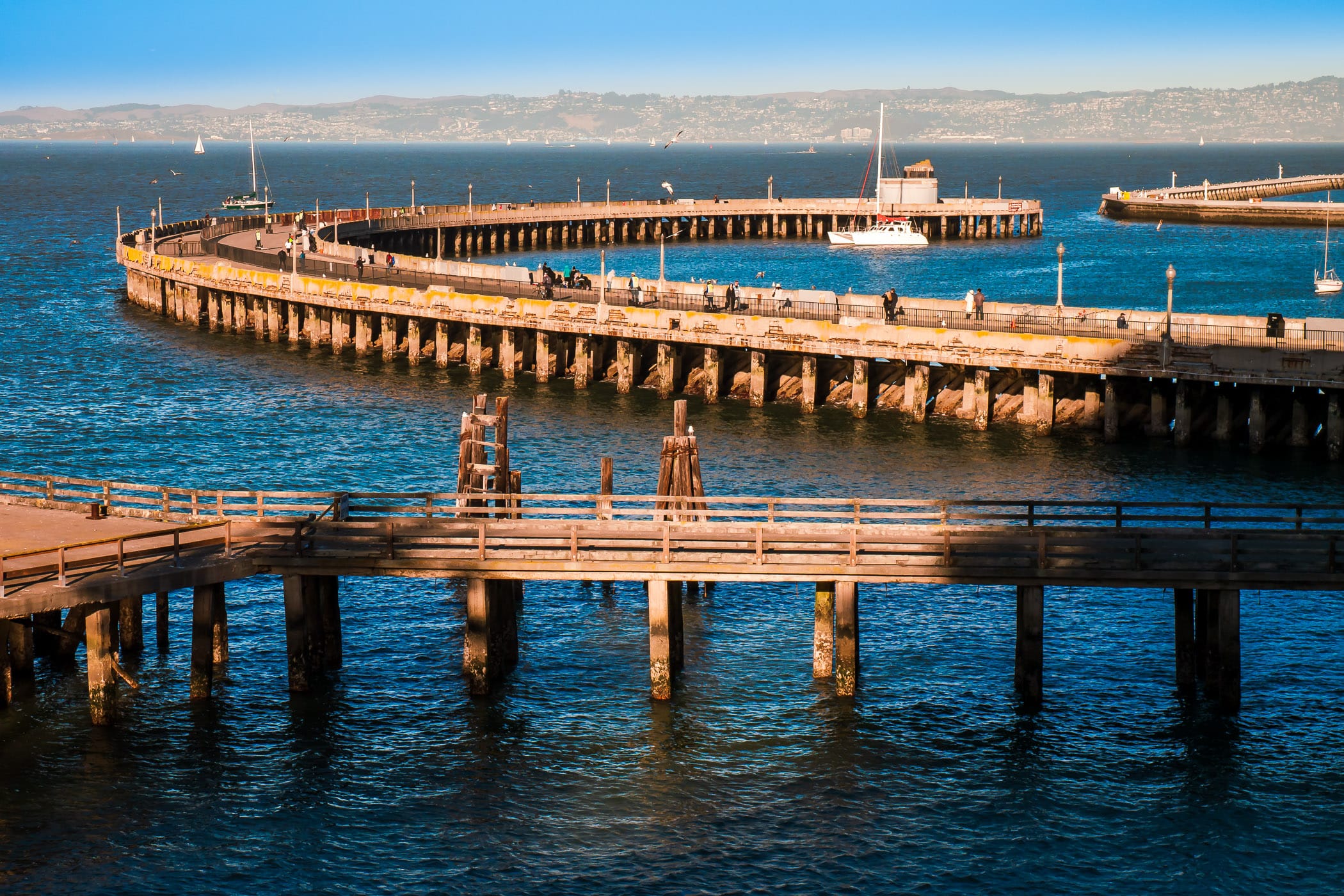 San Francisco's 1400-foot-long Aquatic Park Pier curves out into San Francisco Bay.