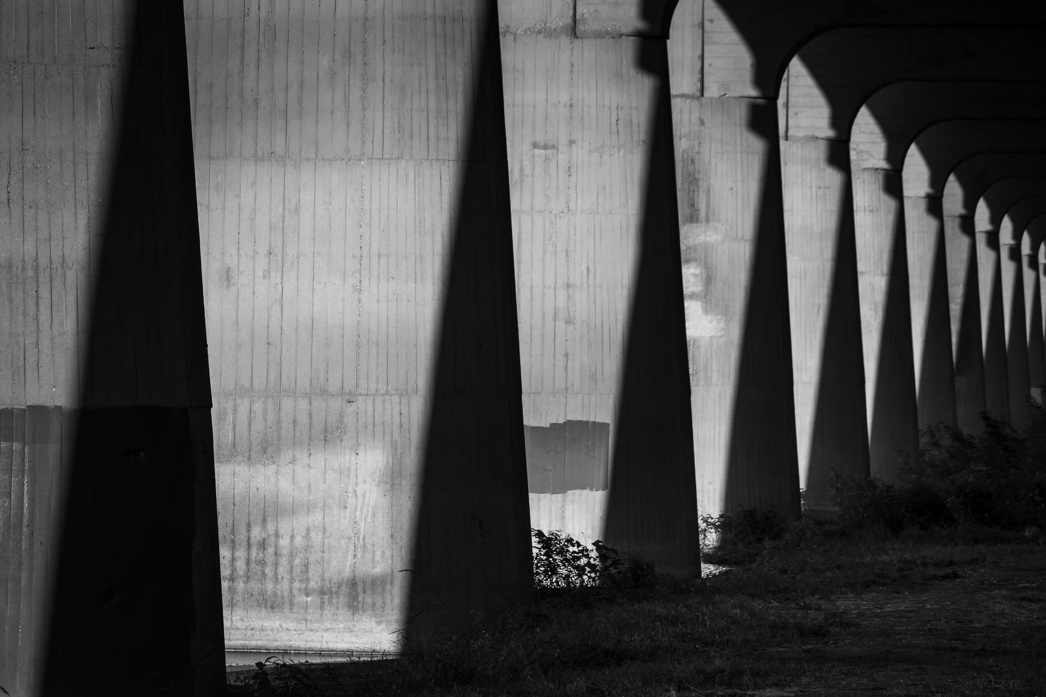 Shadows fall on the supports for the Commerce Street Viaduct, Dallas, Texas.