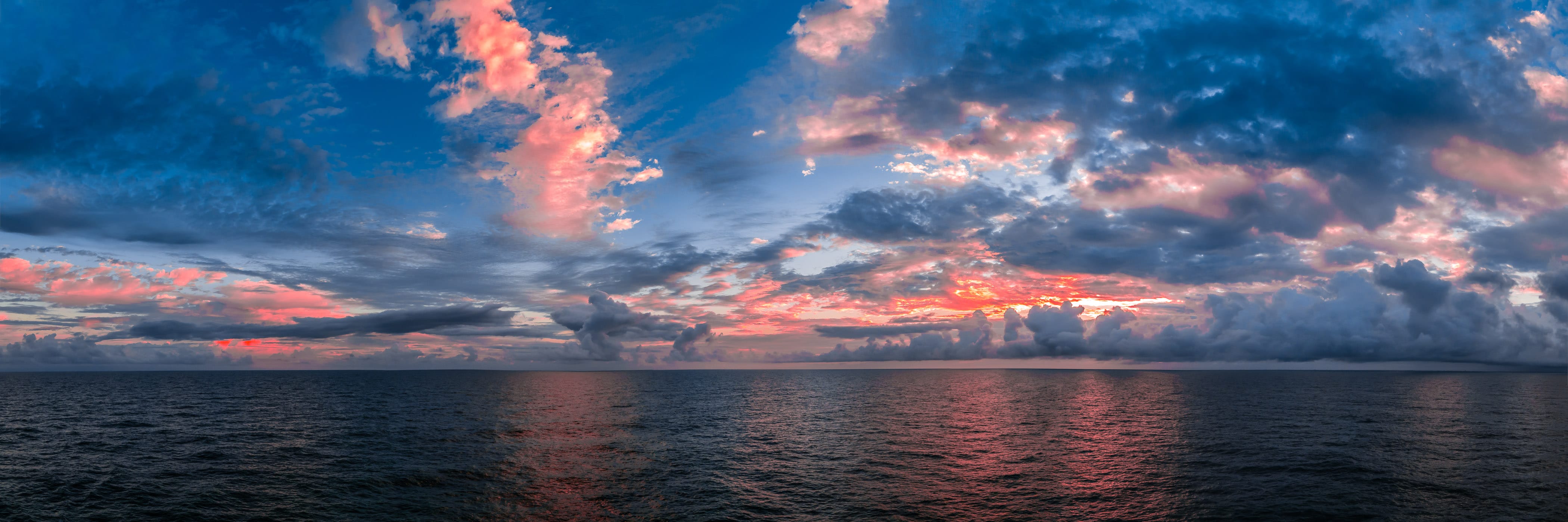 The first light of morning breaks over the Gulf of Mexico, somewhere north of the Yucatan Peninsula, Mexico. (Click the photo to view a larger version)