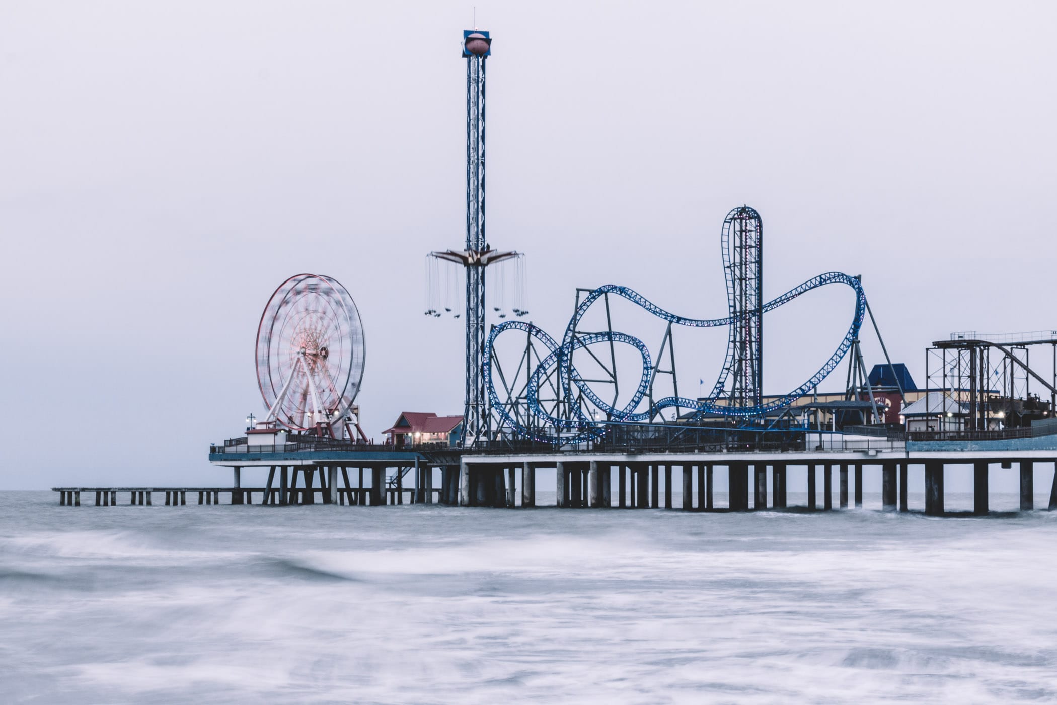 Galveston, Texas' Historic Pleasure Pier reaches out into the cold wind and overcast skies of the Gulf of Mexico.