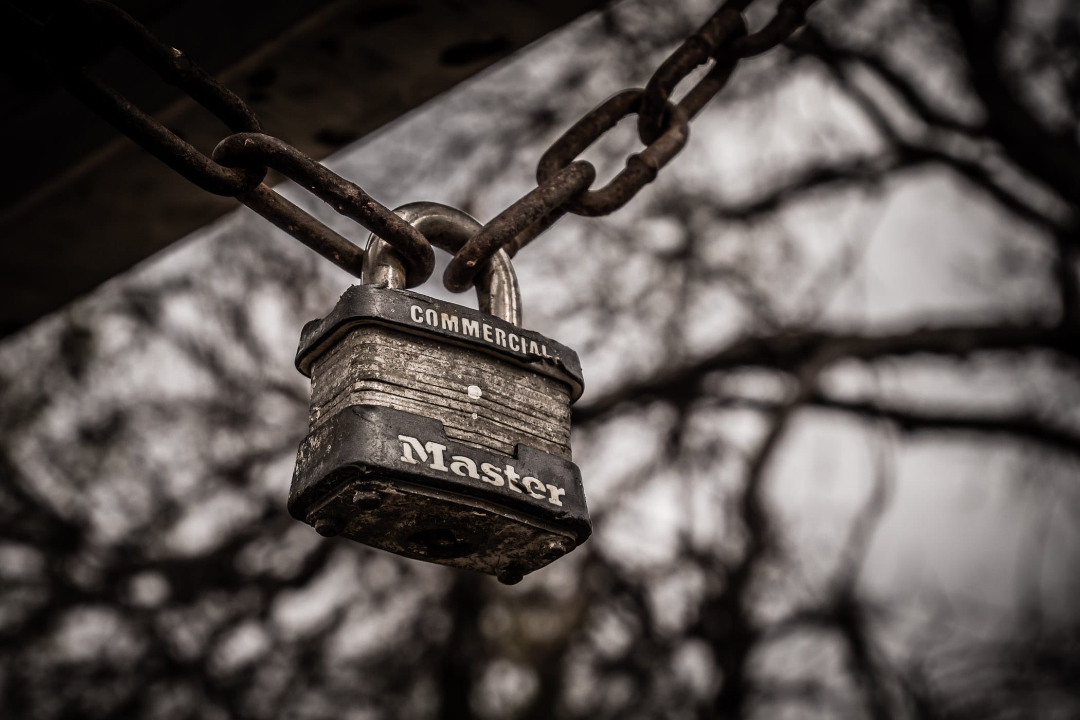 A padlock hangs from a chain in Richardson, Texas' Breckinridge Park.