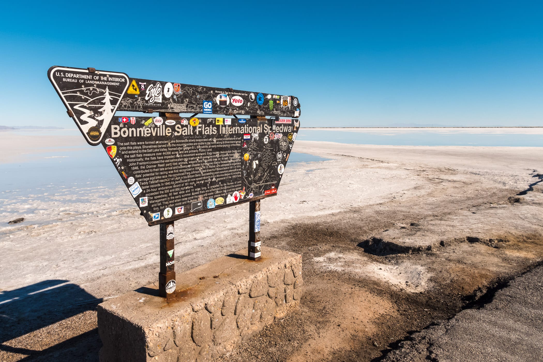 A sign at the Bonneville Salt Flats International Speedway in Utah explains the history of the site to visitors.