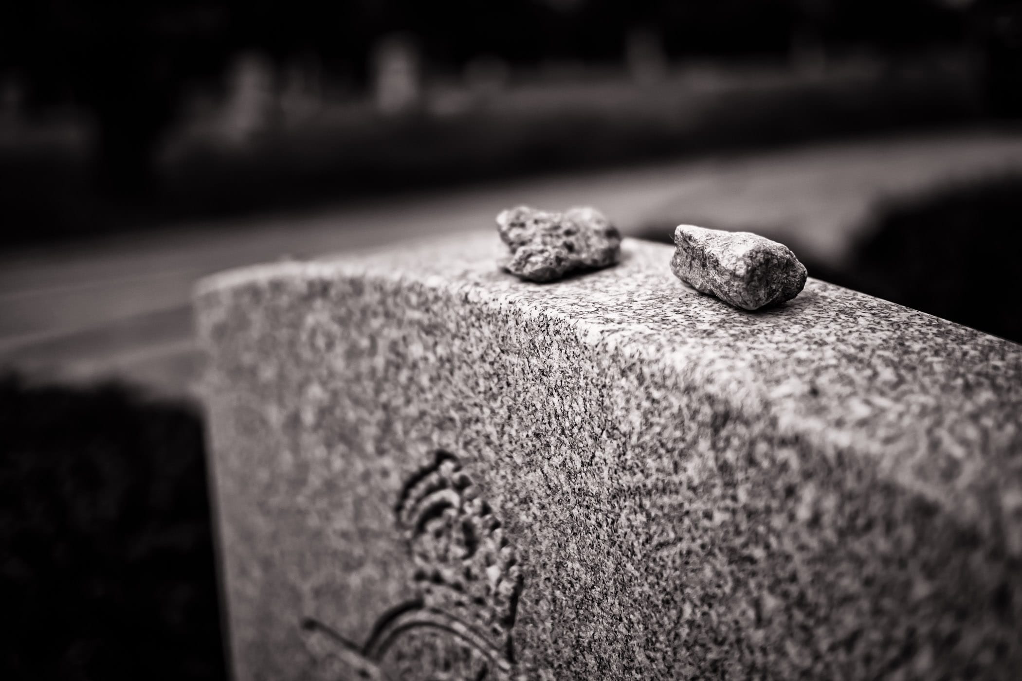 Visitation stones atop a Jewish aviator's grave at the Royal Air Force Cemetery at Oakland Memorial Park in Terrell, Texas. The RAF Cemetery holds the remains of 20 aviators who died while training at the nearby No. 1 British Flying Training School during World War II.