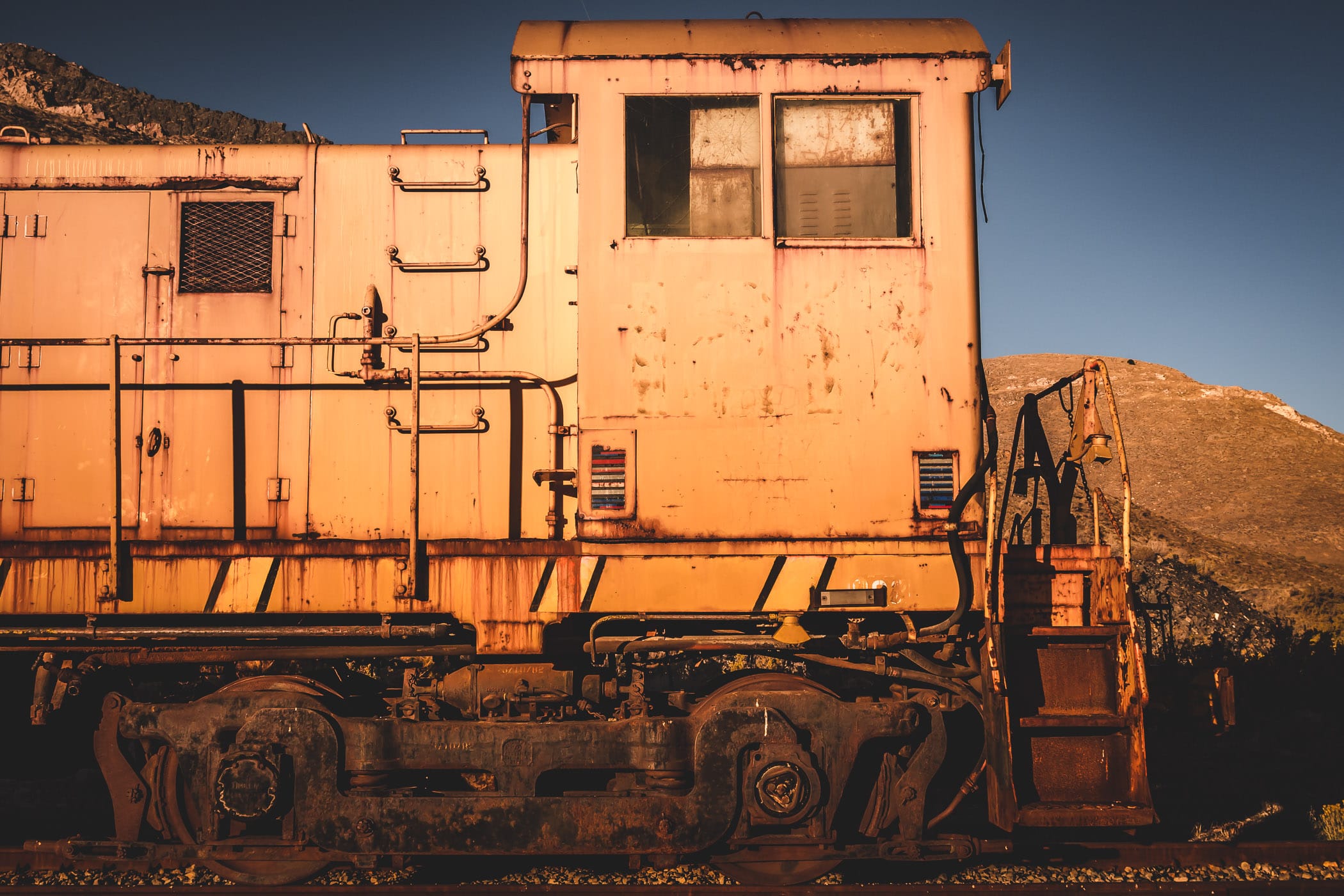 Detail of a train engine abandoned in the desert near Magna, Utah.