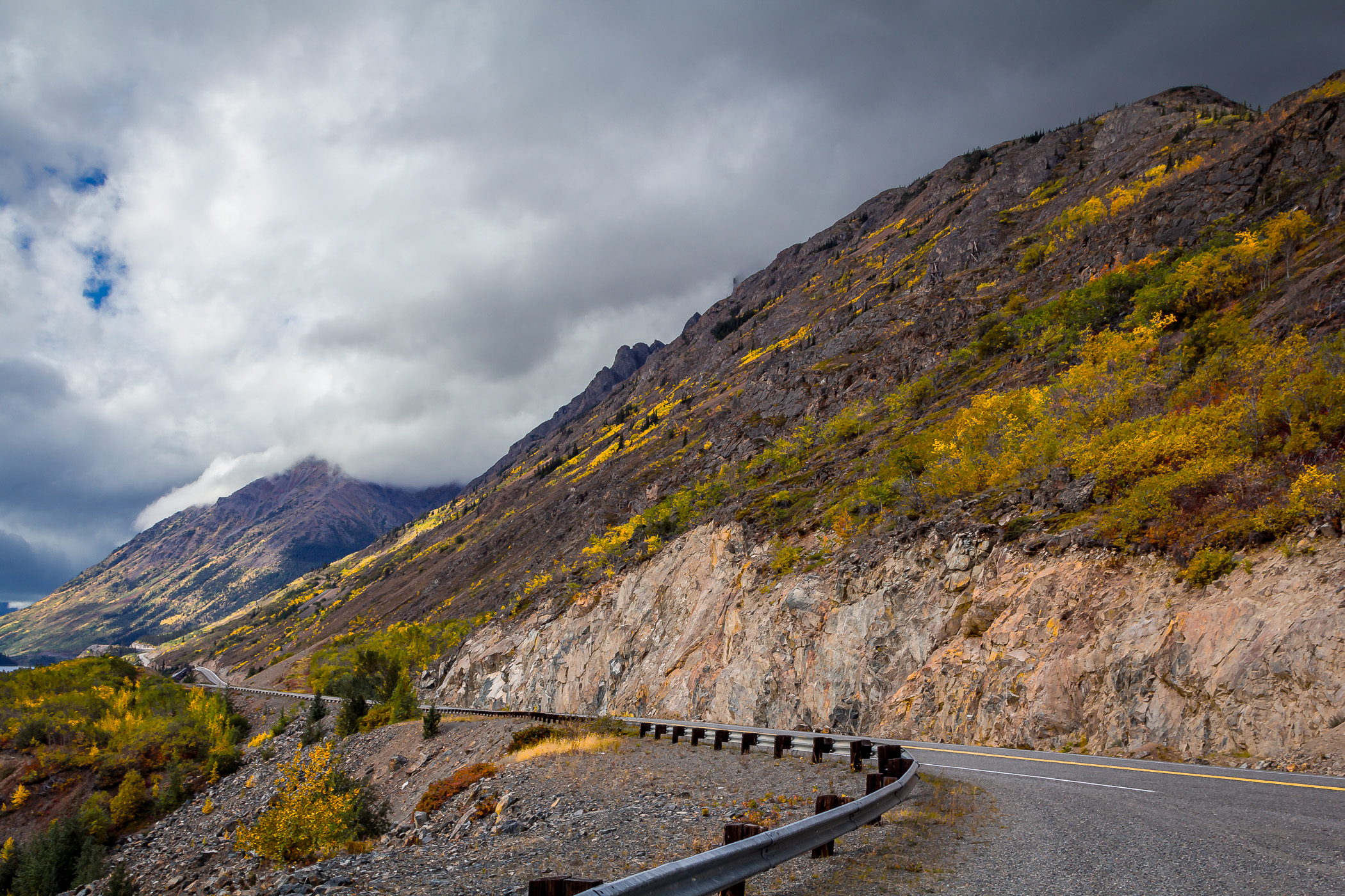 Storm clouds form over the mountains along the Klondike Highway in Canada's Yukon Territory.