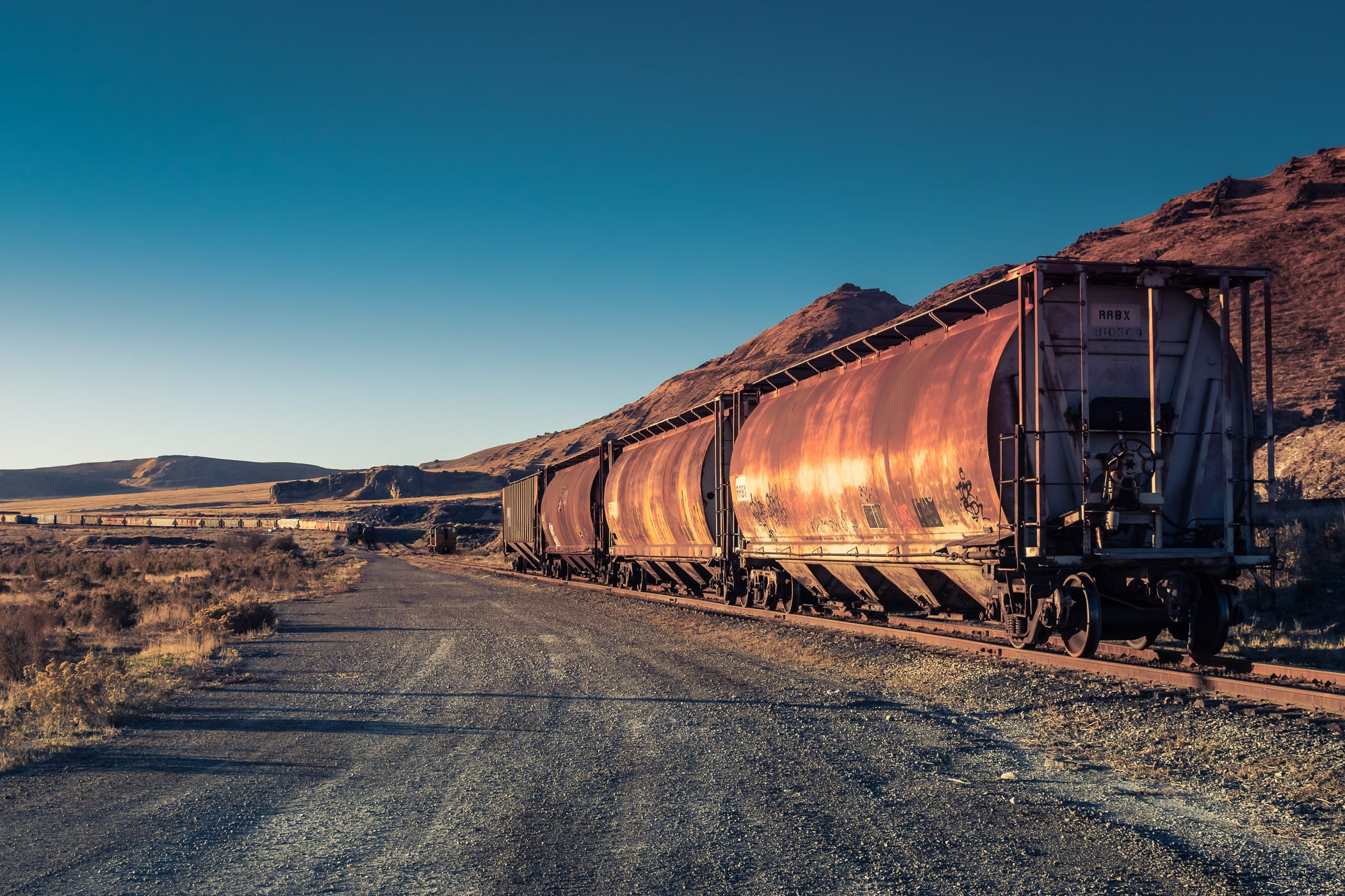 Railcars sit abandoned on a rail siding near Magna, Utah.