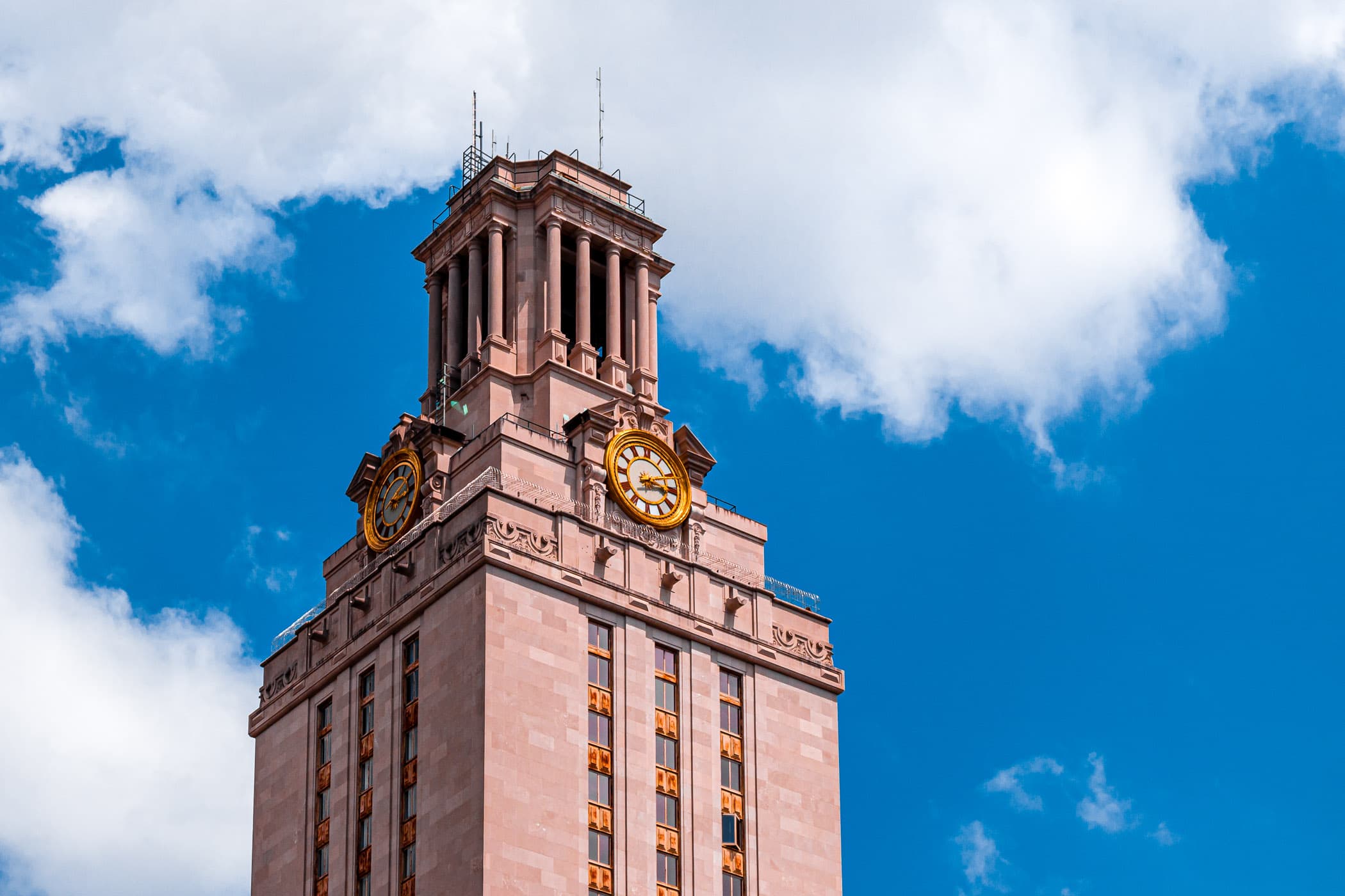 The 307-foot-tall Main Building at the University of Texas at Austin rises into the cloudy Texas sky.