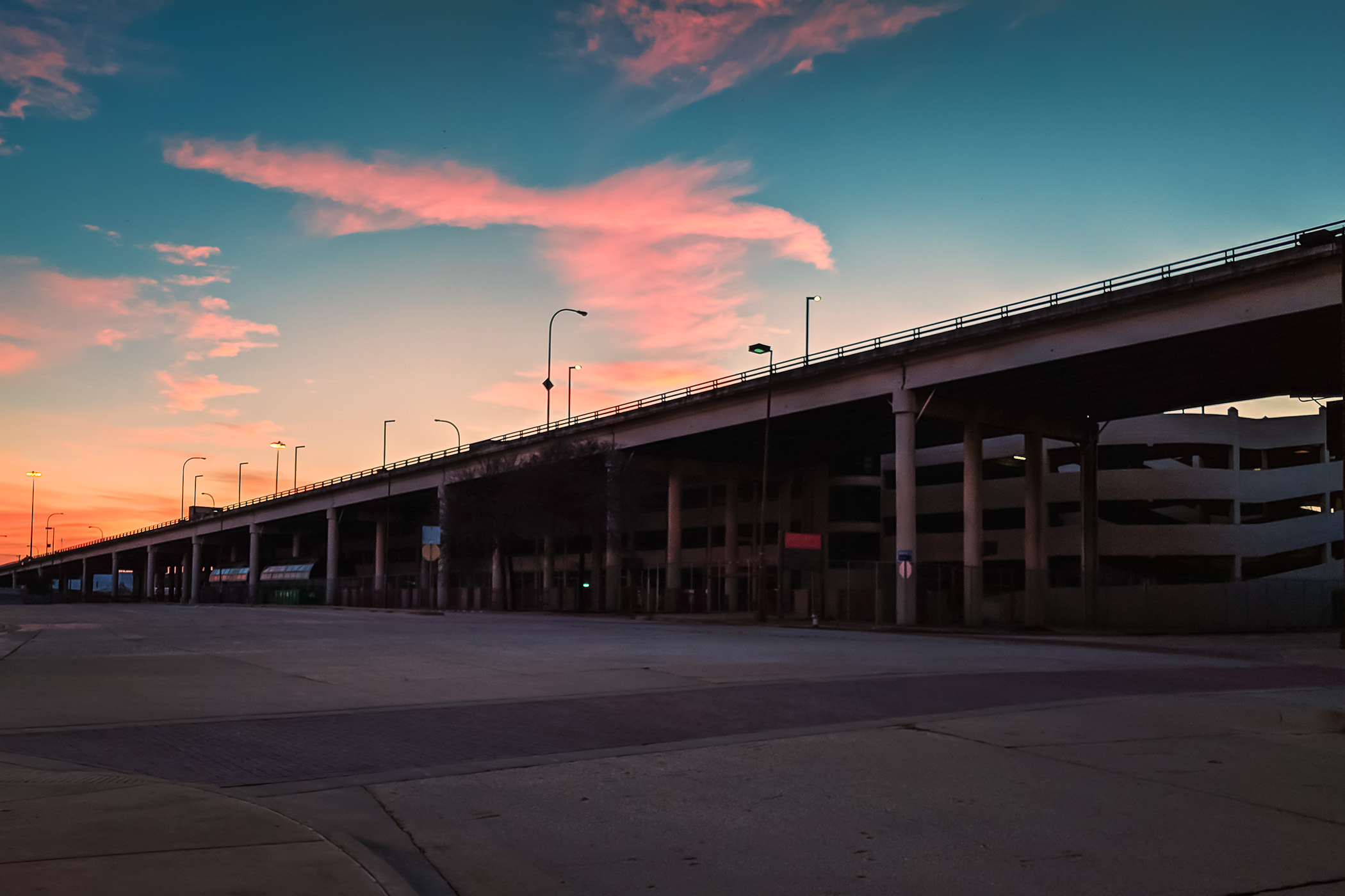 Dallas' Jefferson Boulevard Viaduct is silhouetted by the last light of day on the west end of downtown.