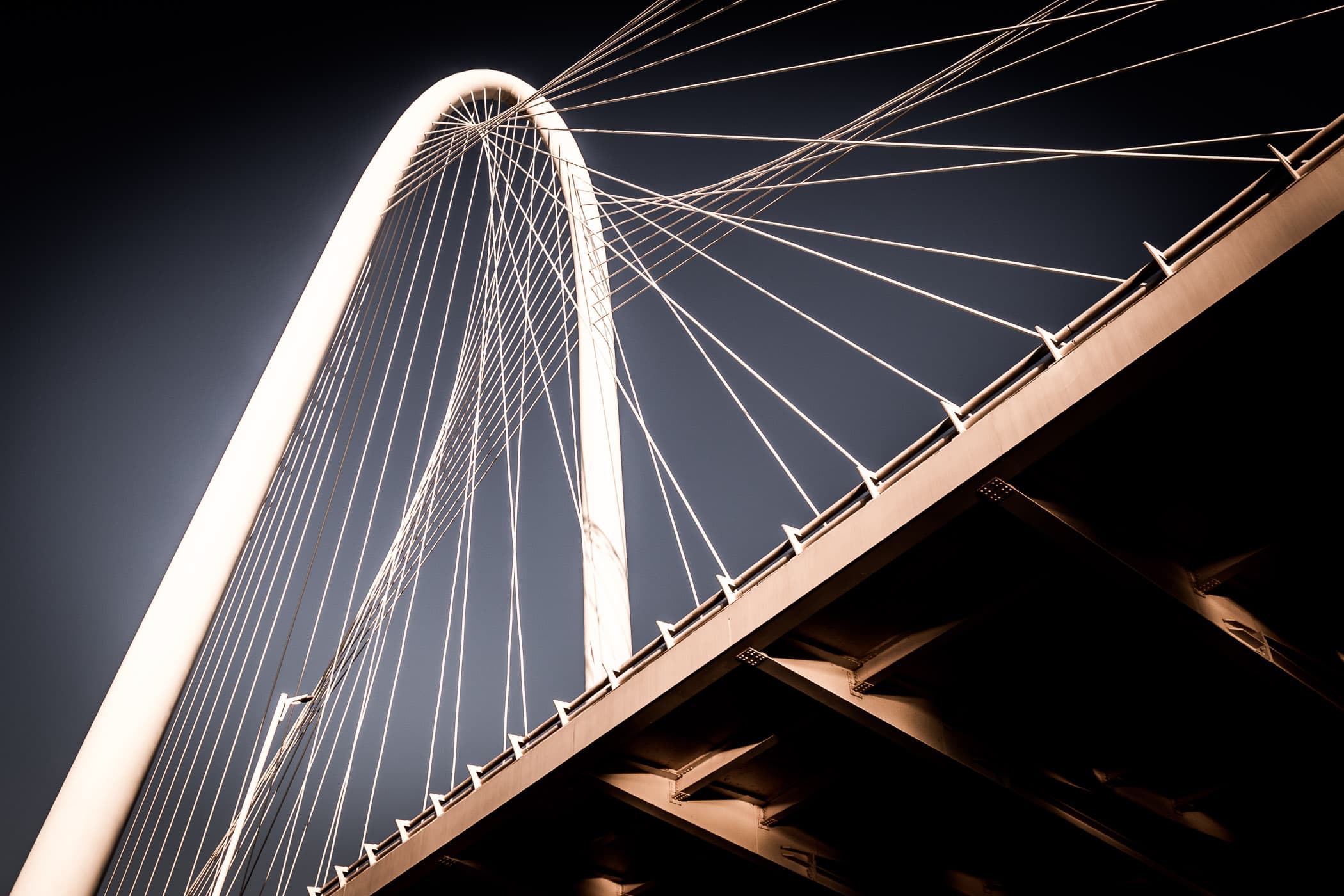 The Santiago Calatrava-designed Margaret Hunt Hill Bridge rises into the sky over Dallas.