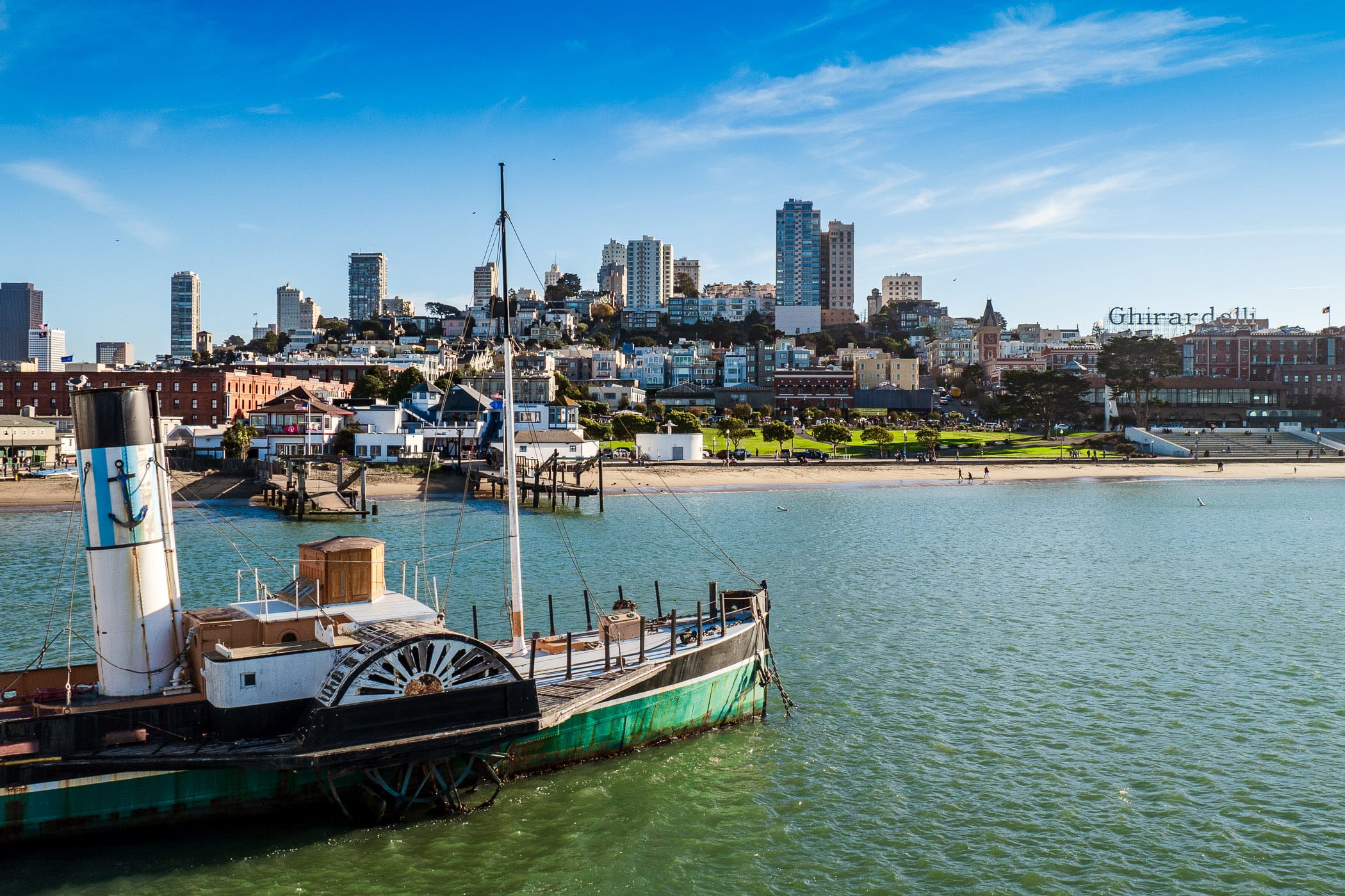 San Francisco's Russian Hill rises over the 1914 paddlewheel tugboat Eppleton Hall at the San Francisco Maritime National Historical Park.