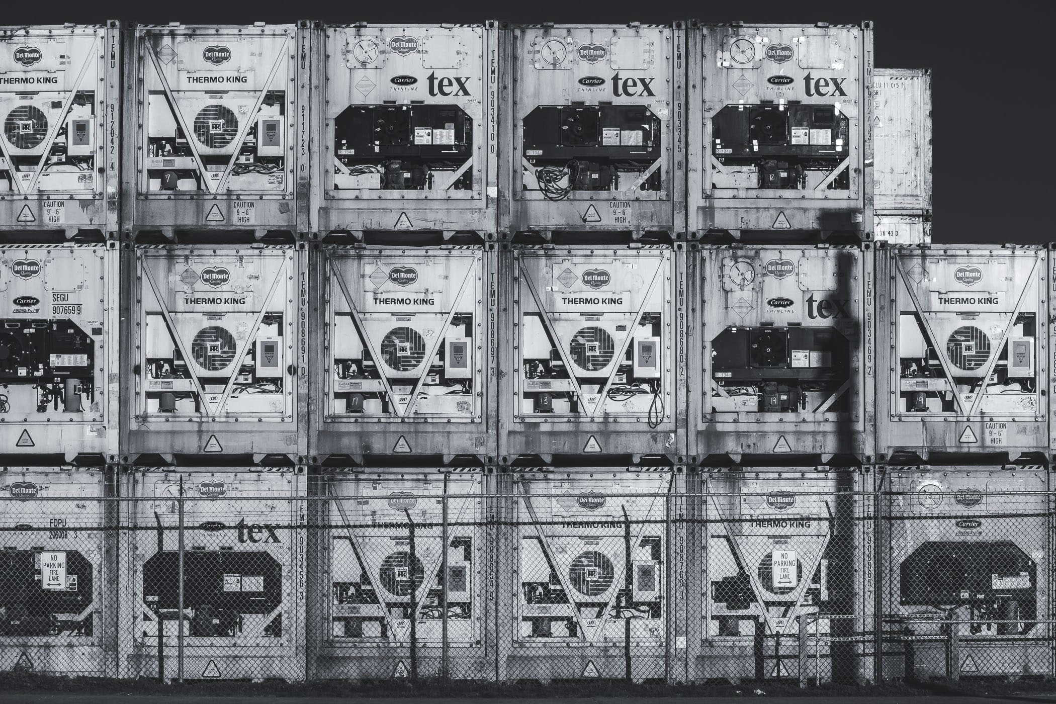 Refrigerated containers, or reefers, stacked in a container yard in Galveston, Texas.