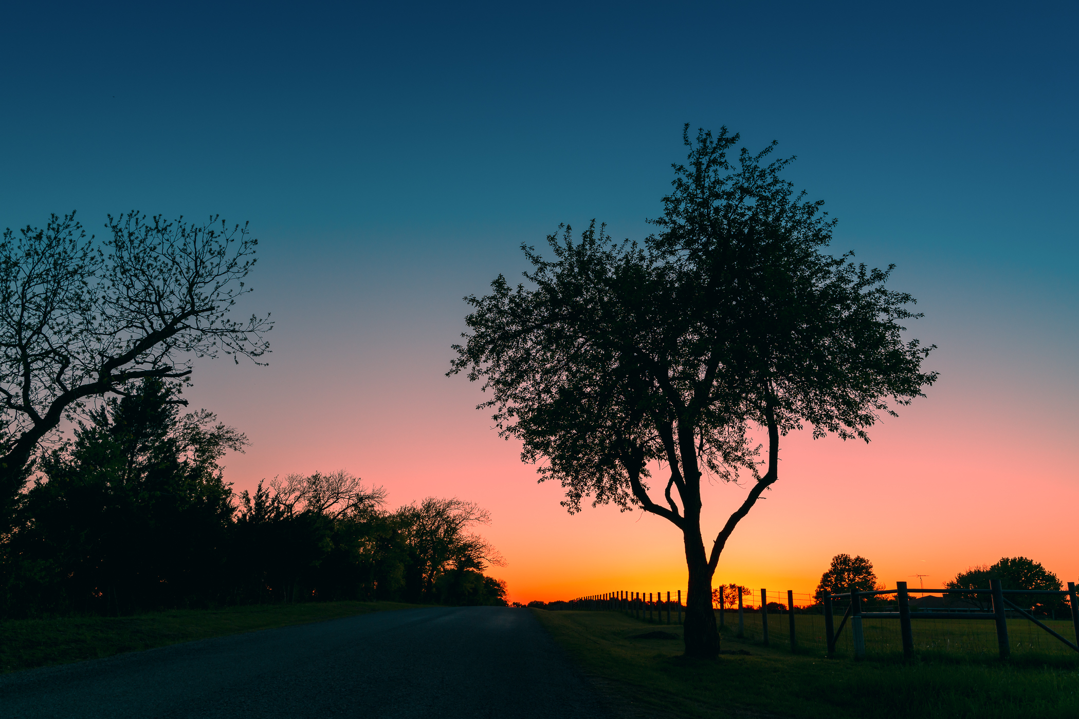 The sun sets on McKinney, Texas' Erwin Park.