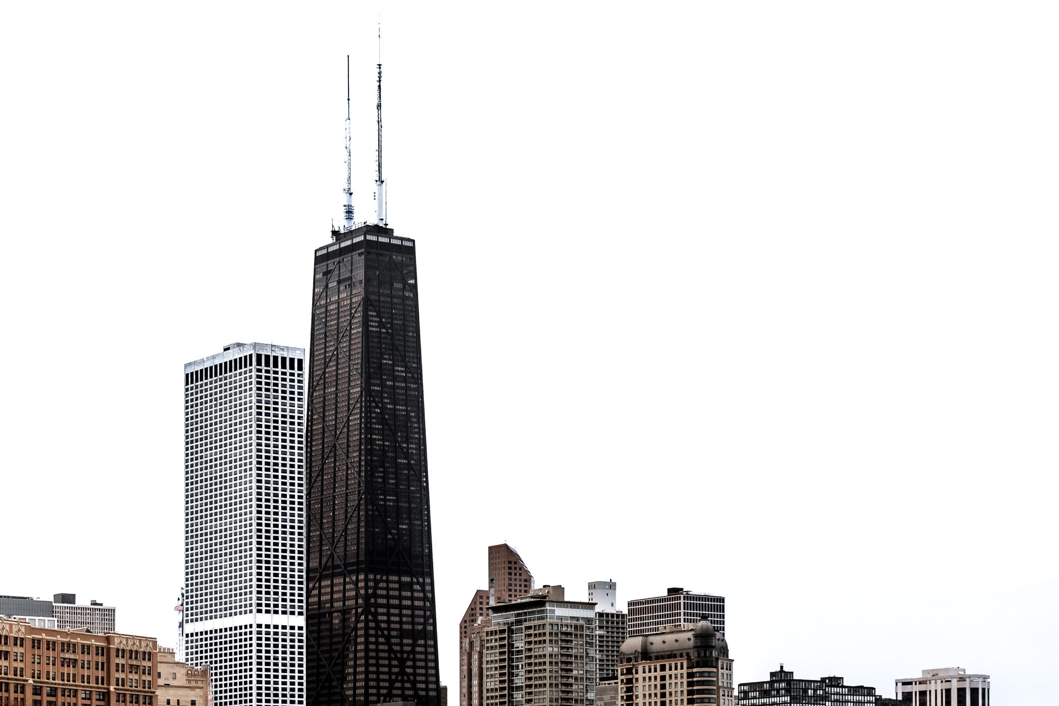 The John Hancock Center—also known as 875 North Michigan Avenue—rises into the sky over Chicago.