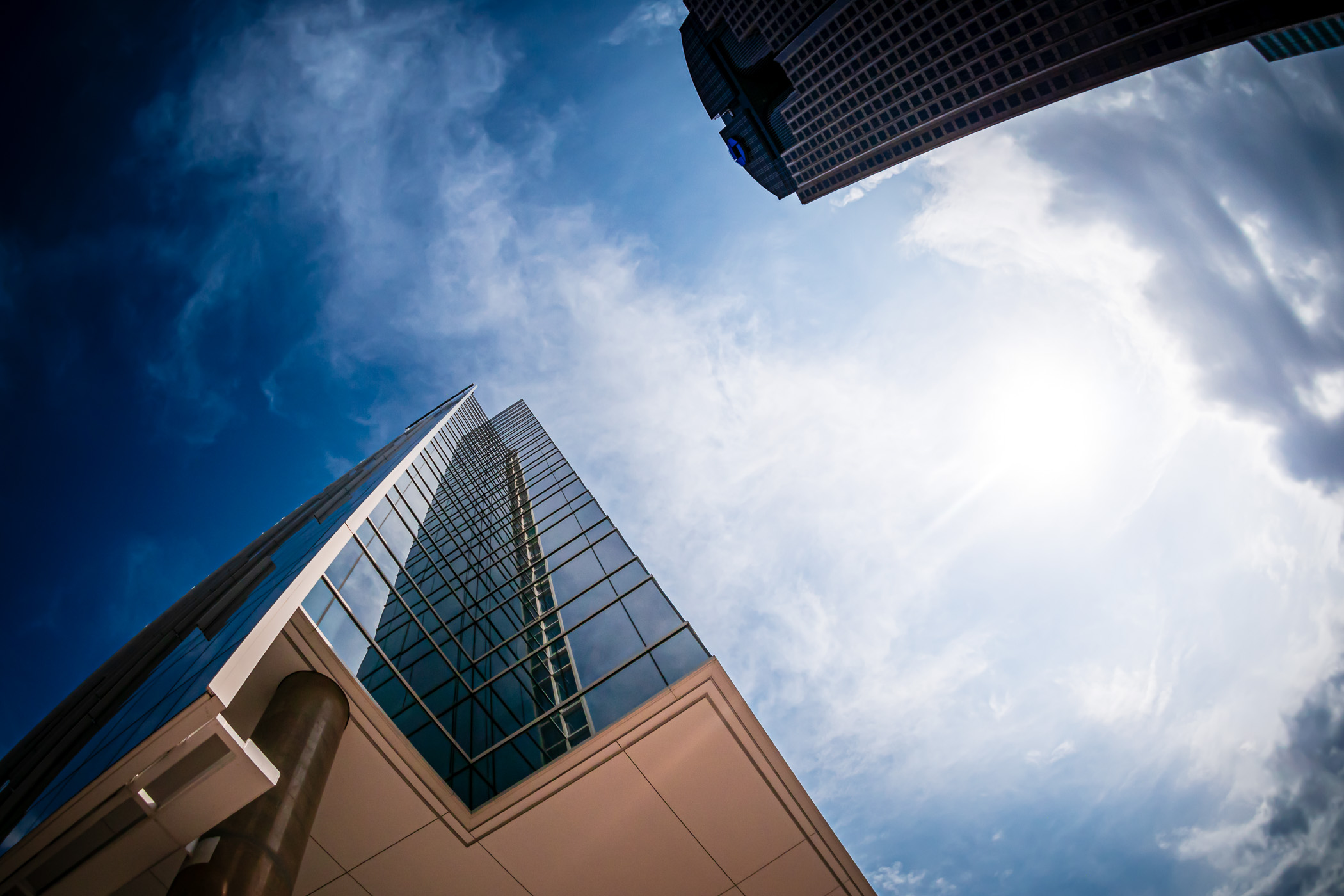 Dallas' HALL Arts tower and Dallas Arts Tower (formerly Chase Tower) rise into the North Texas sky.