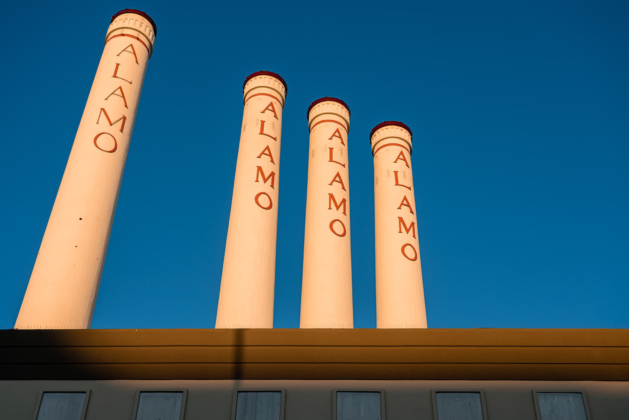 The four 204-foot-tall smokestacks at San Antonio, Texas' Alamo Quarry Market, a former cement factory-turned-shopping center.