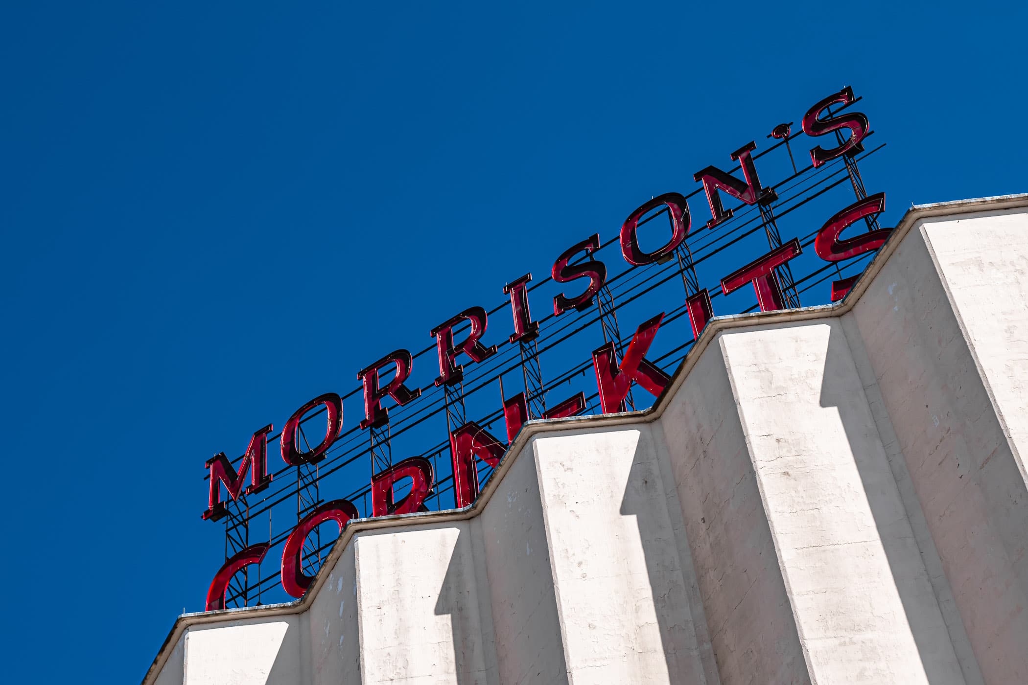 A sign for Morrison's Corn-Kits atop a Denton, Texas, grain elevator.