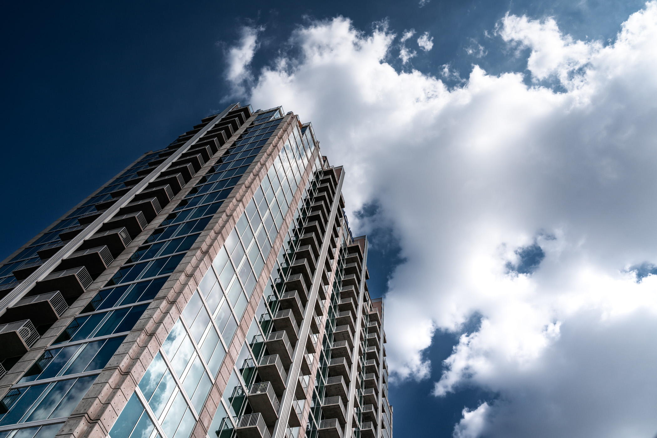 Skyhouse Dallas reaches to the clouds over North Texas.