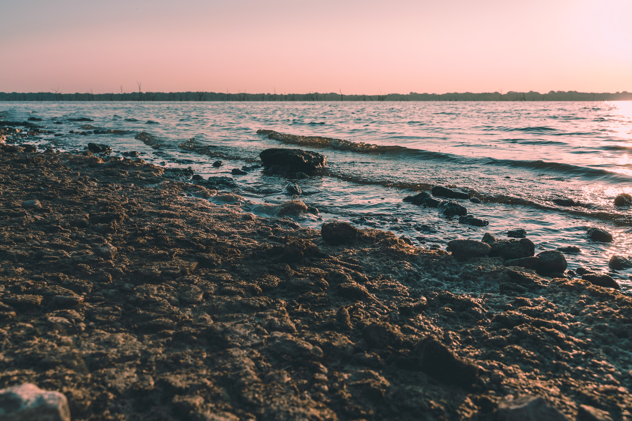 The sun rises on North Texas' Lake Lavon.