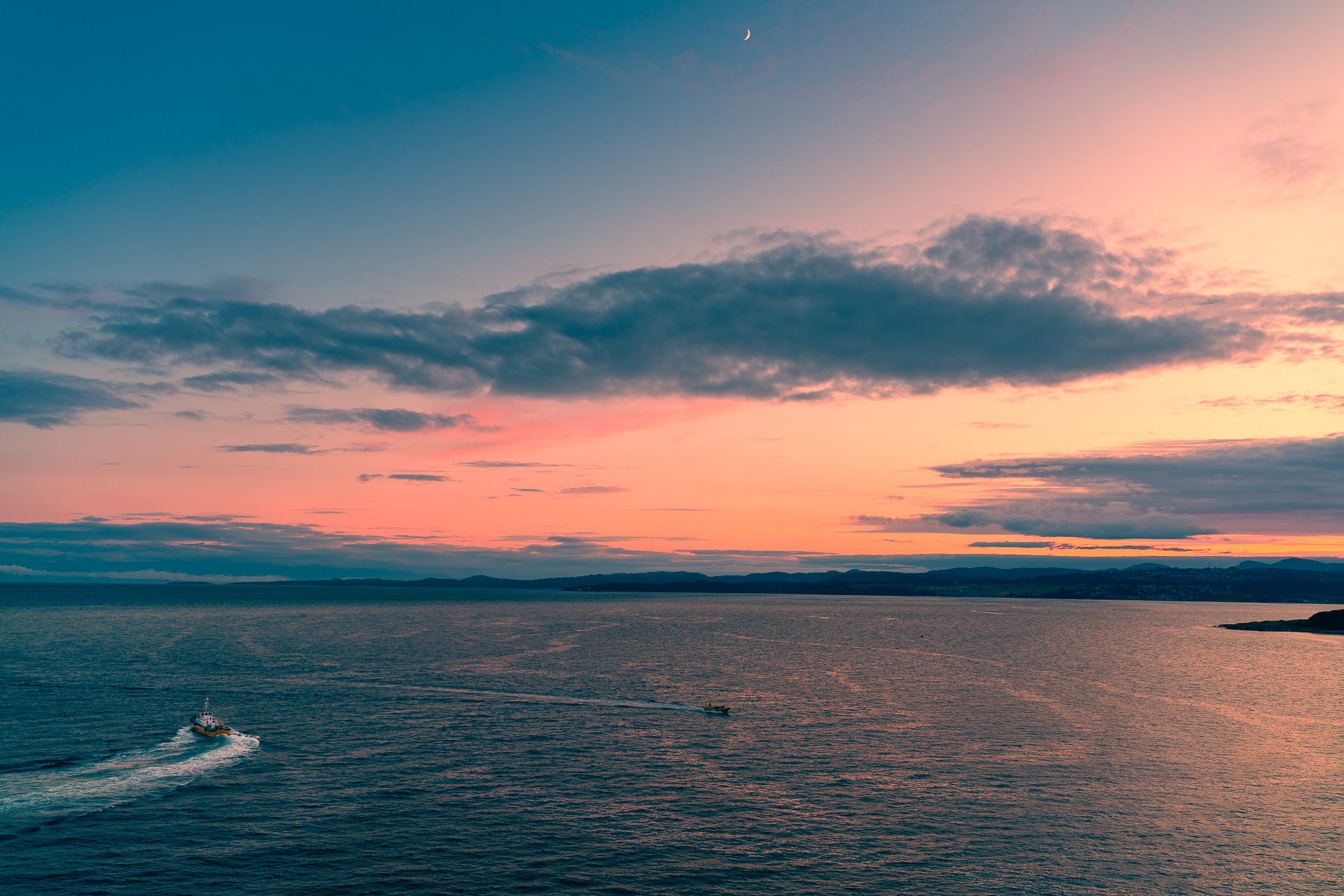 The sun sets on the Victoria, British Columbia, harbour.