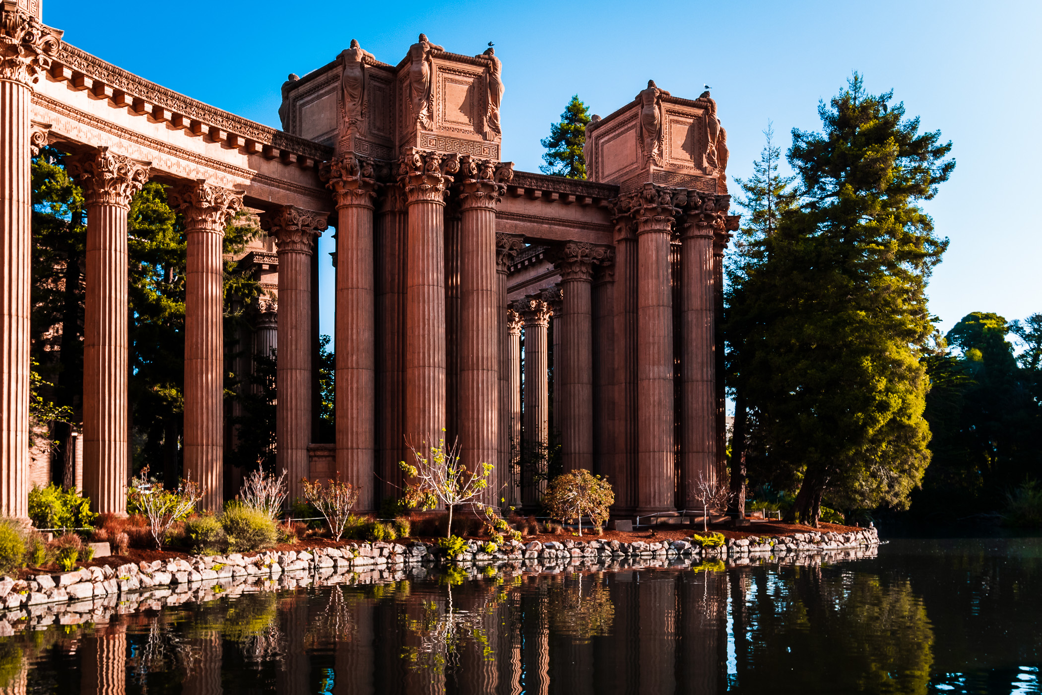 The morning sun lights the ornate columns of San Francisco's Palace of Fine Arts.