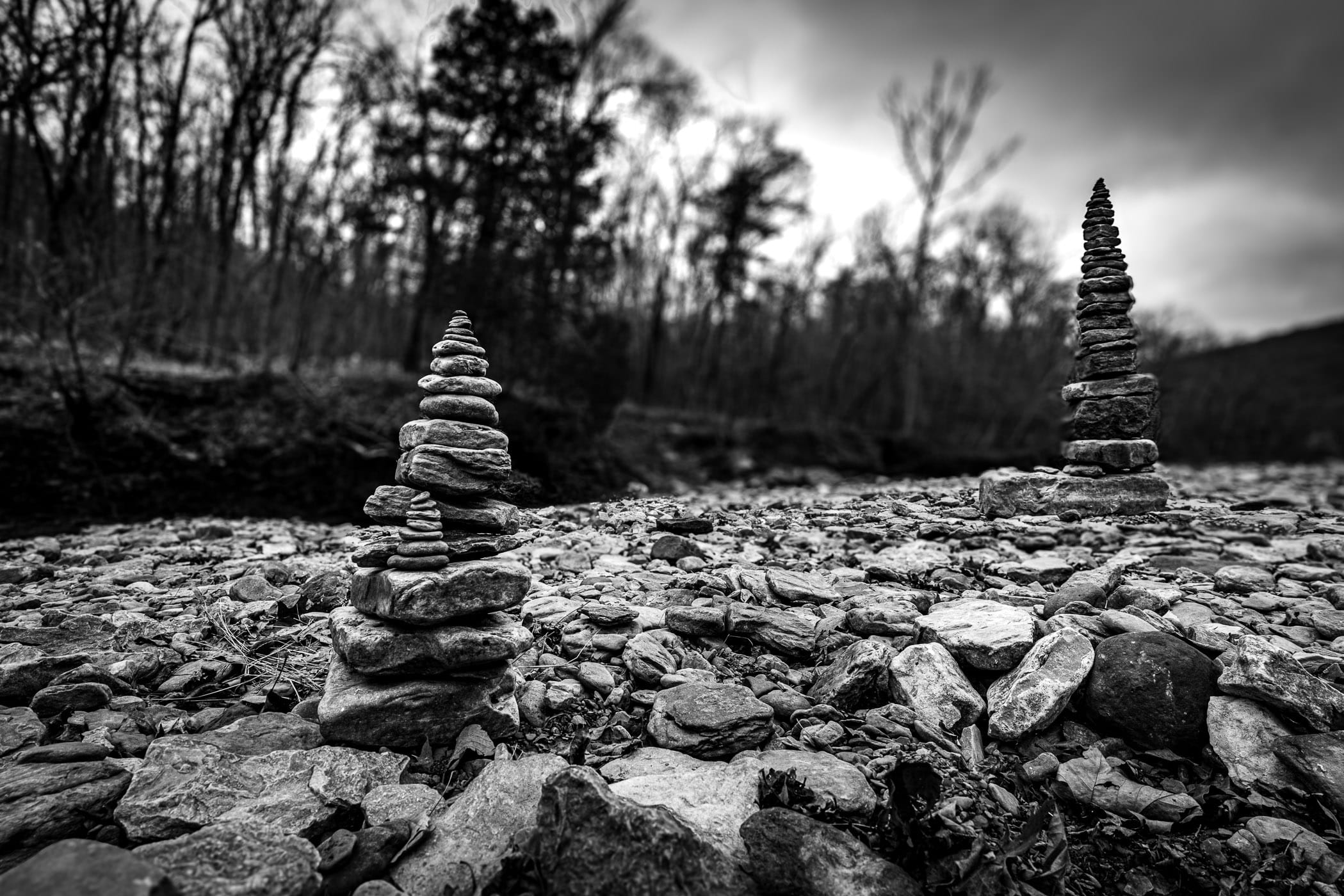Stacked rocks spotted in a dry riverbed at Devil's Den State Park, Arkansas.