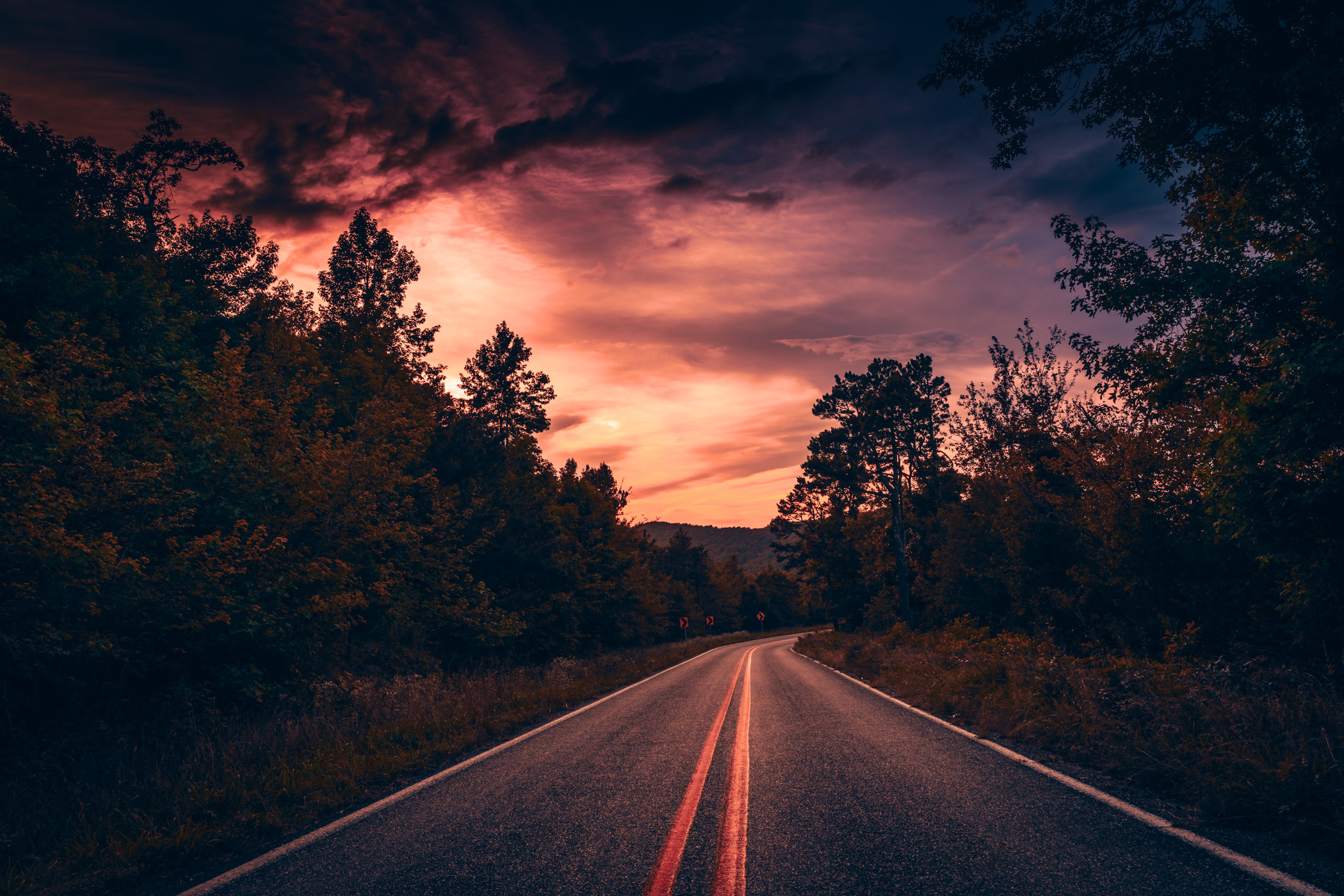 The sun sets on the Ouachita Mountains and the Talimena National Scenic Byway near Mena, Arkansas.