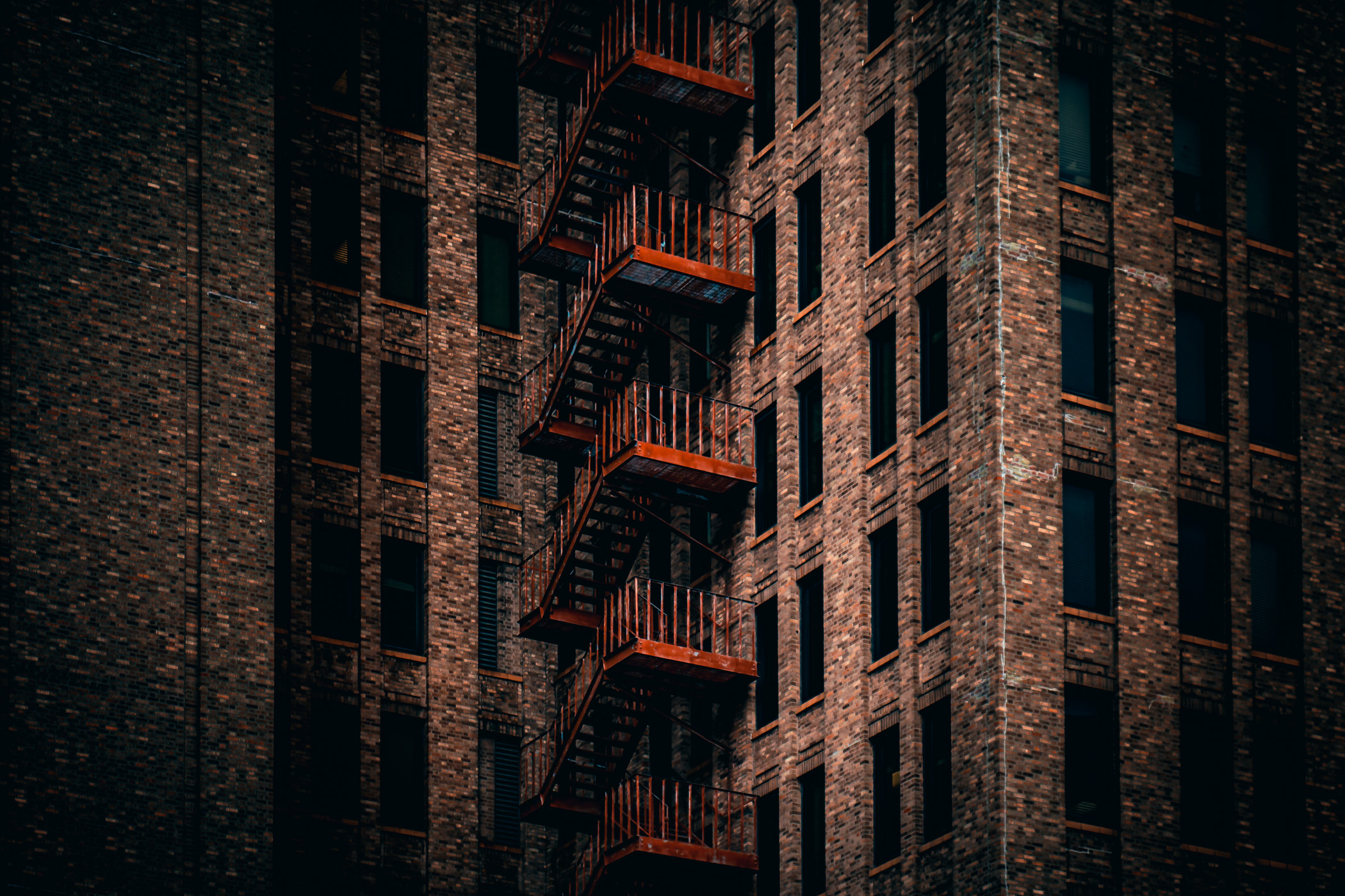 A fire escape climbs the outside of Downtown Houston's Great Southwest Building.