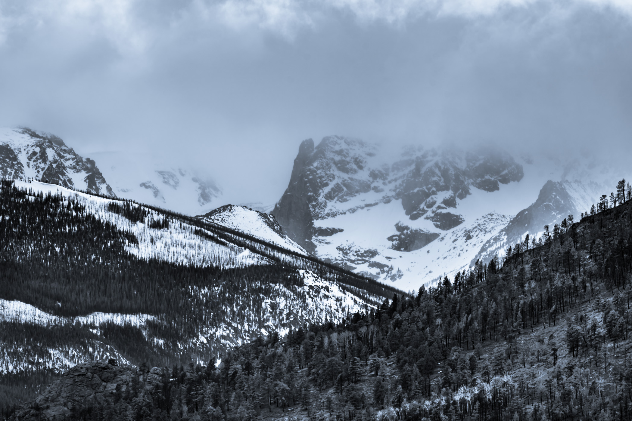 A late winter storm rolls in over Colorado's Rocky Mountain National Park.