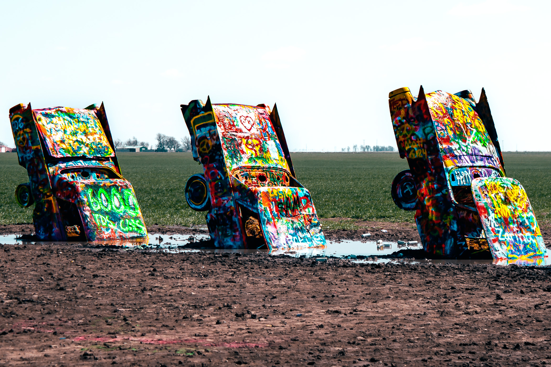 Three of the ten Cadillacs that make up part of the Cadillac Ranch art installation near Amarillo, Texas.