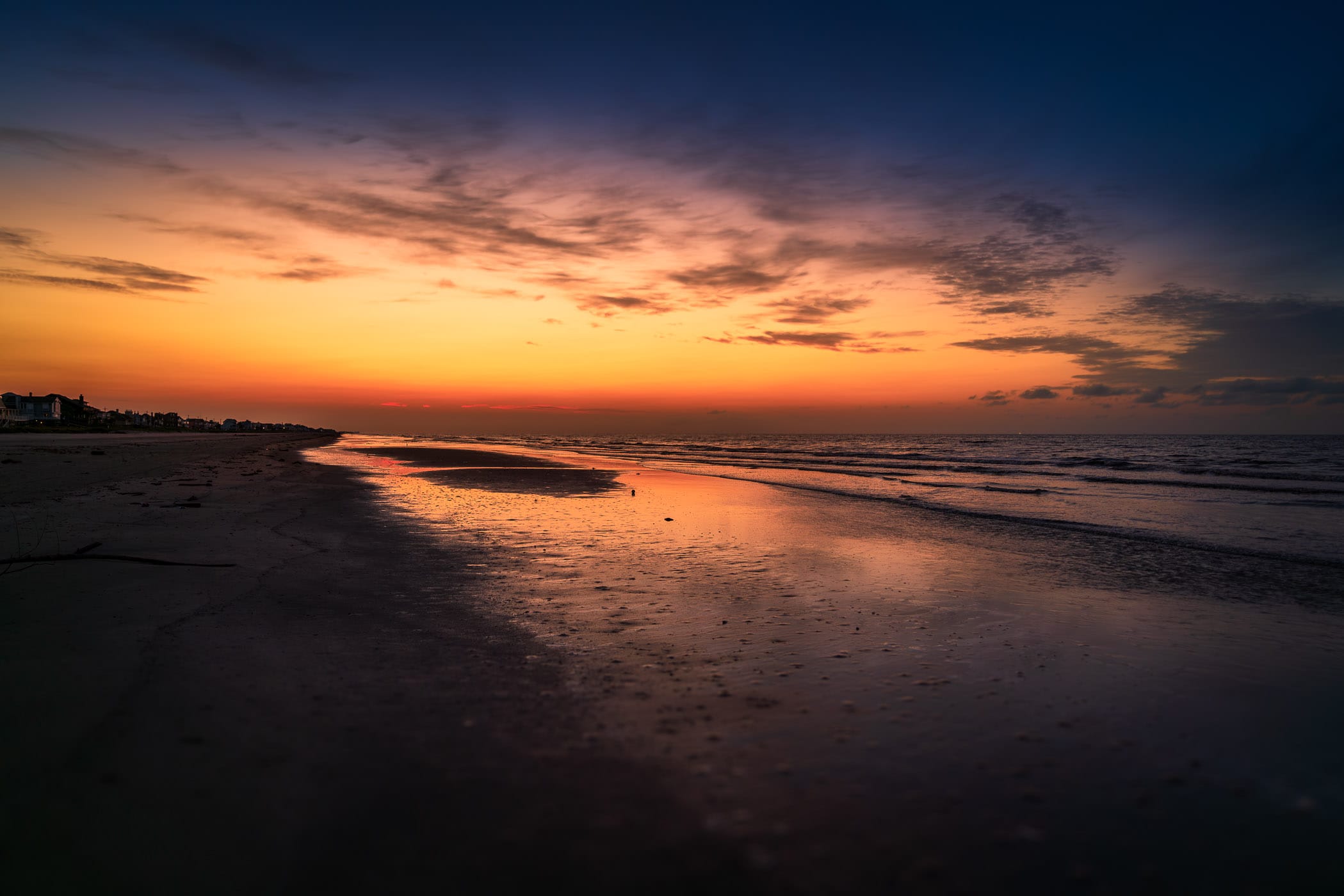 The sun rises on a Galveston, Texas, beach.