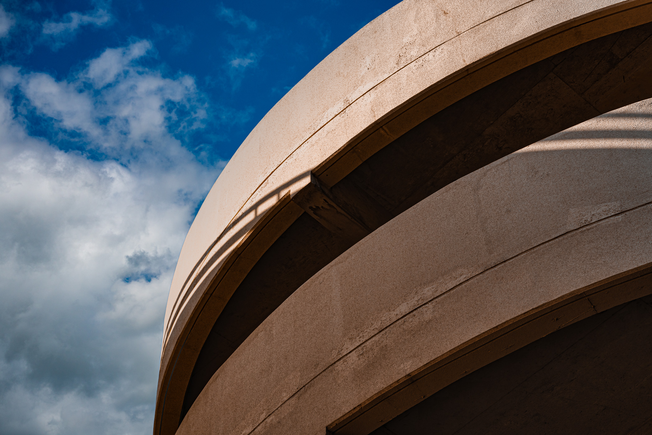 An abstract view of a ramp on an abandoned parking garage near Downtown Dallas, Texas.