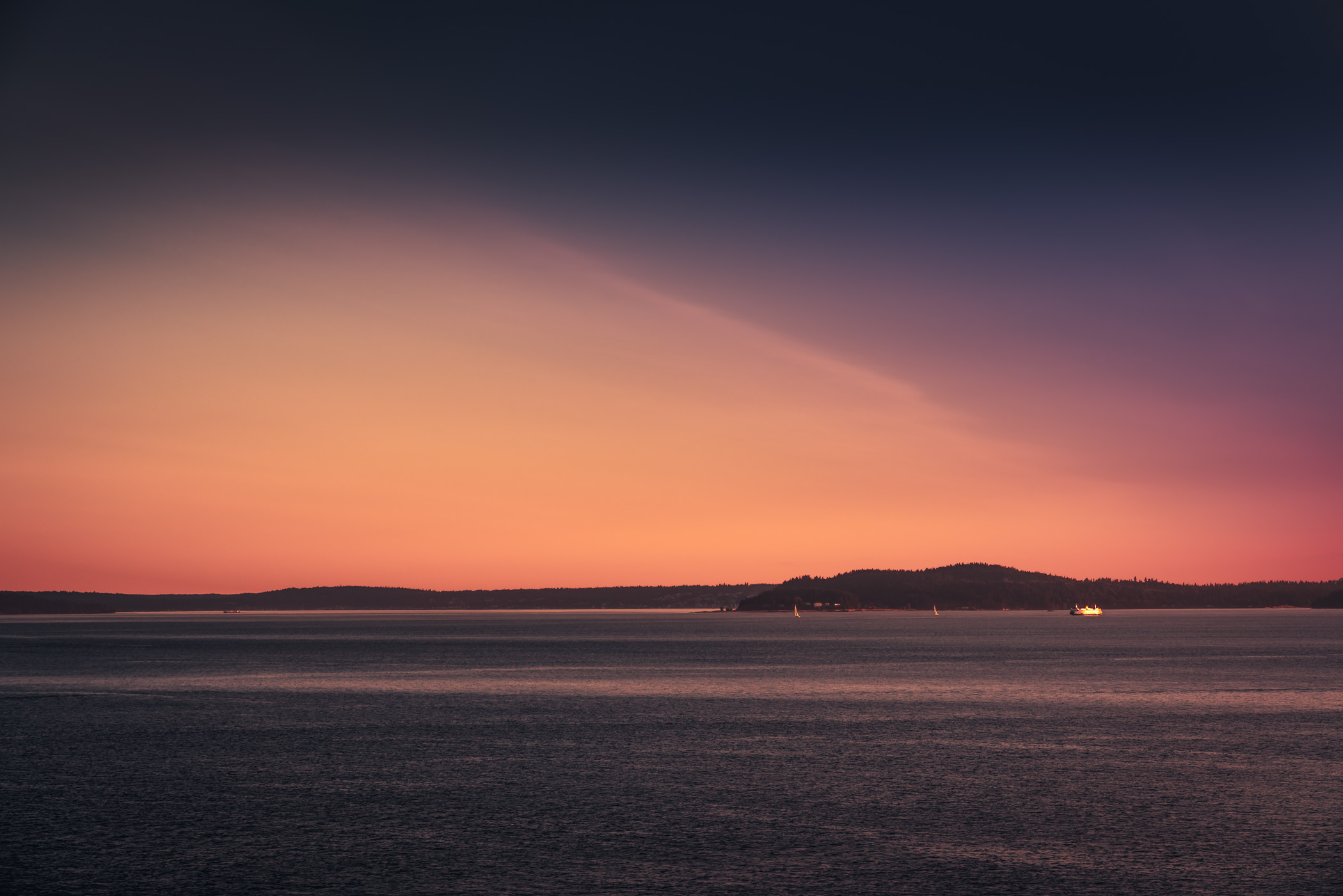 A Washington State Ferry sails Elliott Bay near Seattle, Washington.