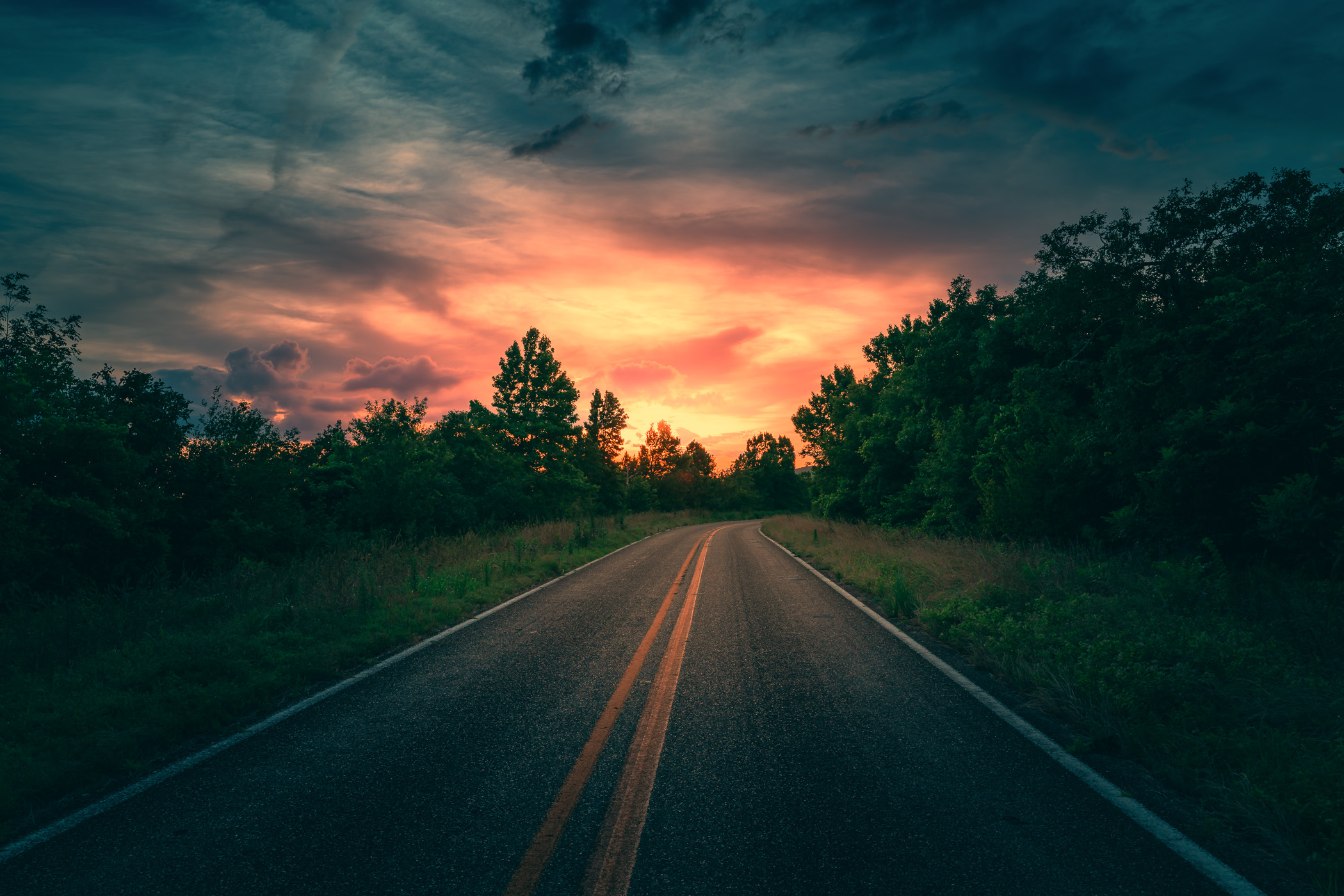 The sun sets on the Talimena National Scenic Byway in the Ouachita Mountains near Mena, Arkansas.
