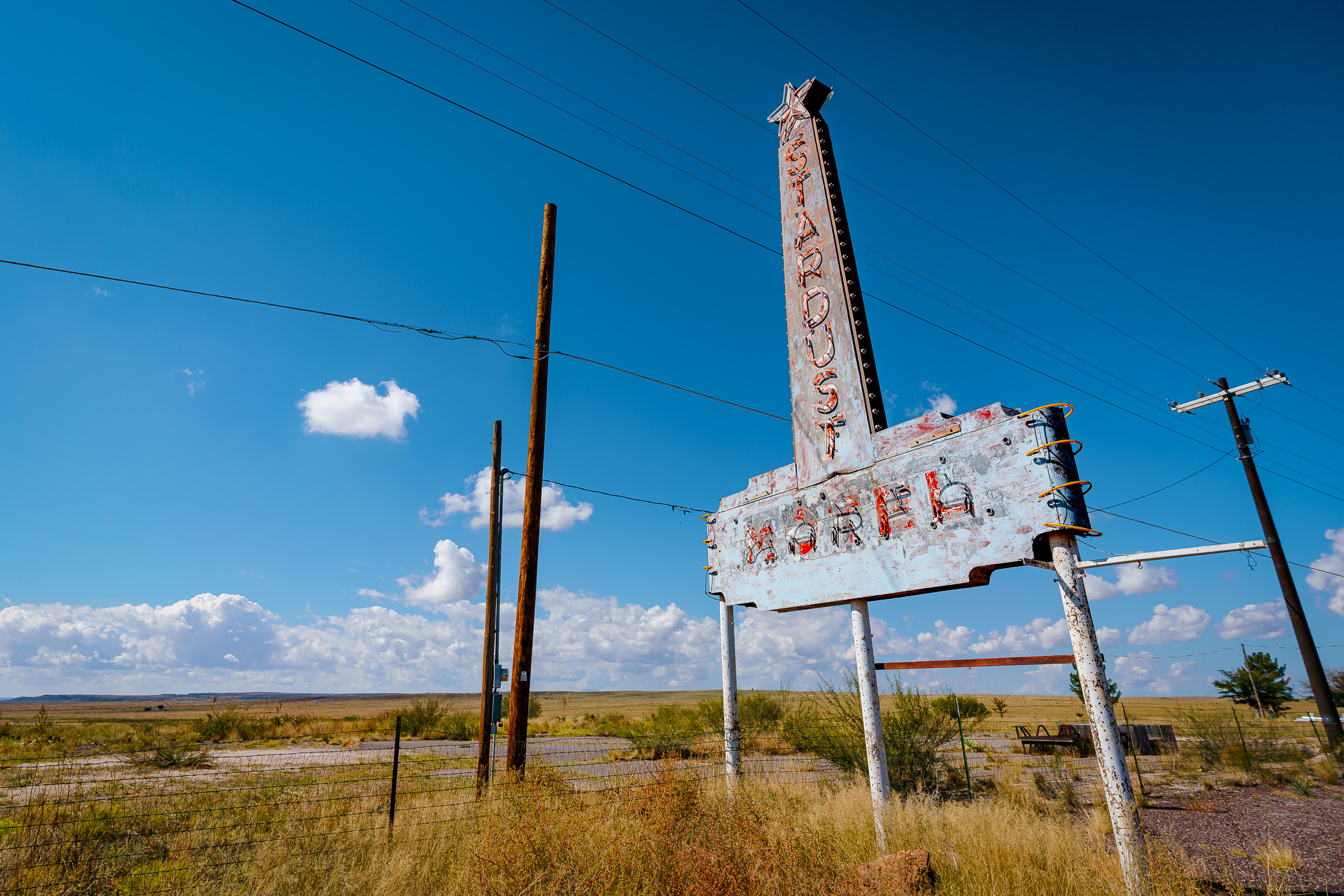 The abandoned, decaying sign of the long-demolished Stardust Motel in Marfa, Texas.