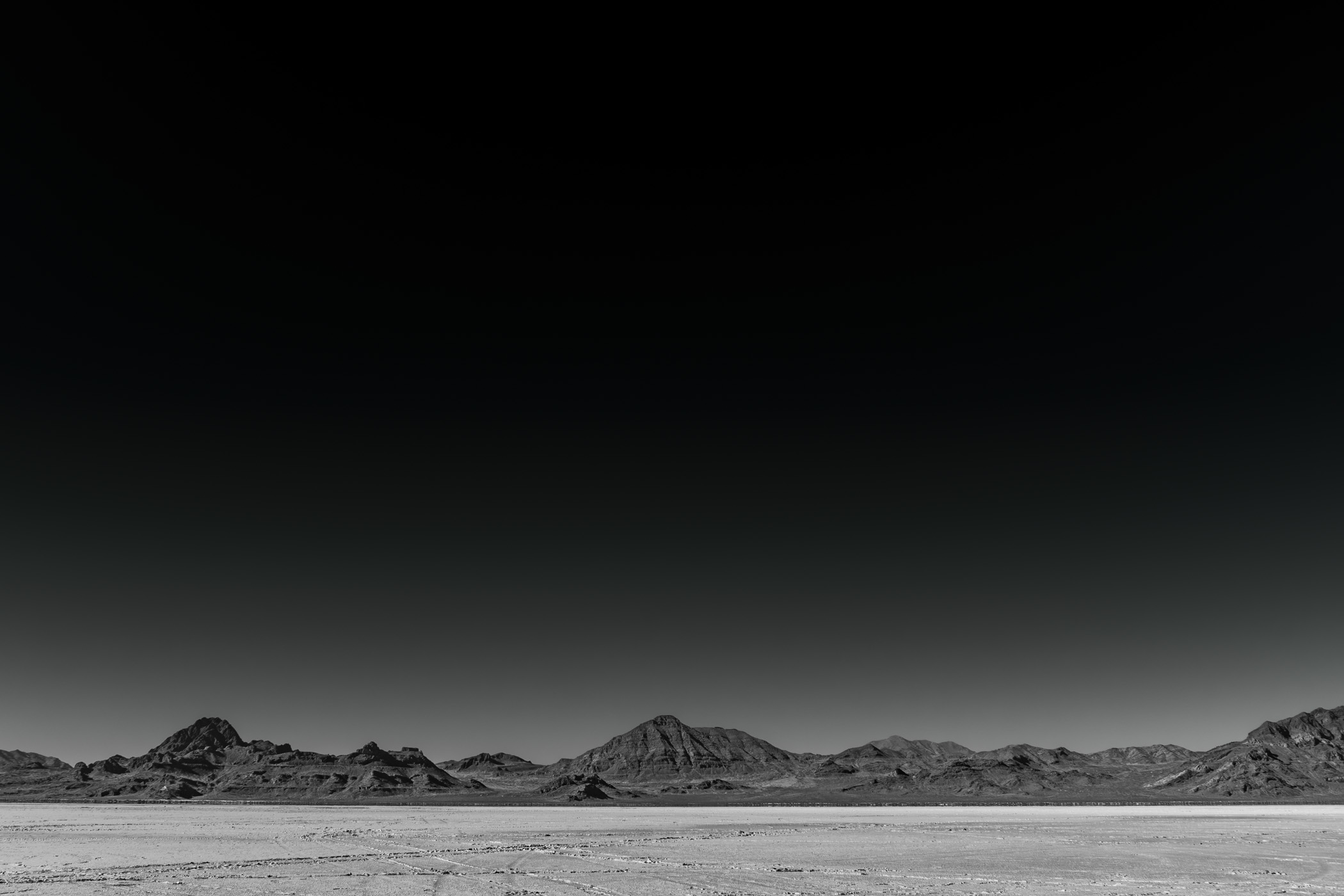 Distant mountains border Utah's Bonneville Salt Flats.