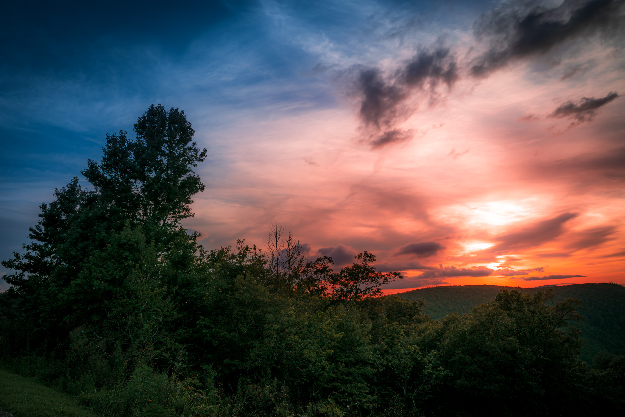  sun sets on the Ouachita Mountains near Mena, Arkansas.