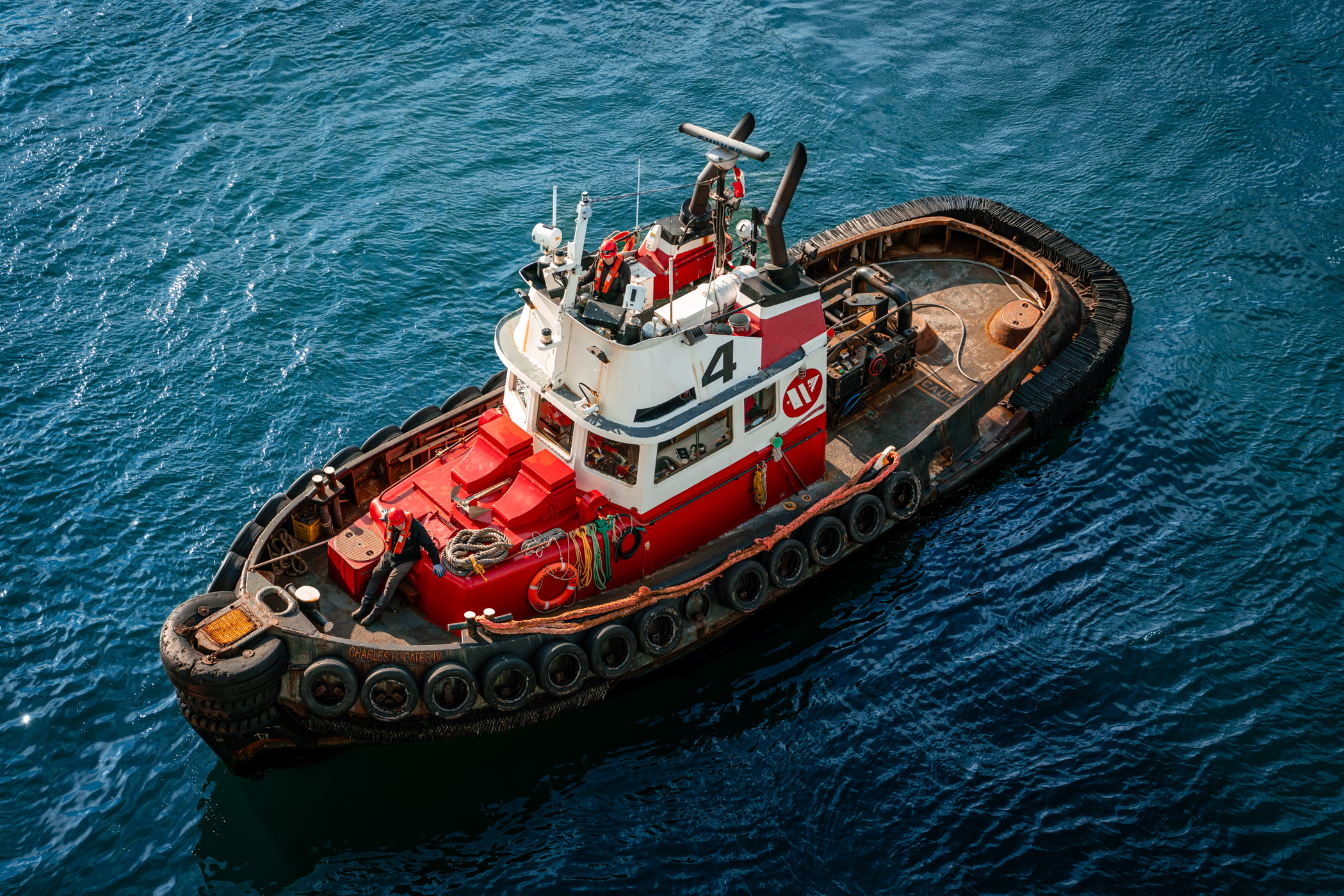 A tugboat plies Victoria Harbour, British Columbia, Canada.