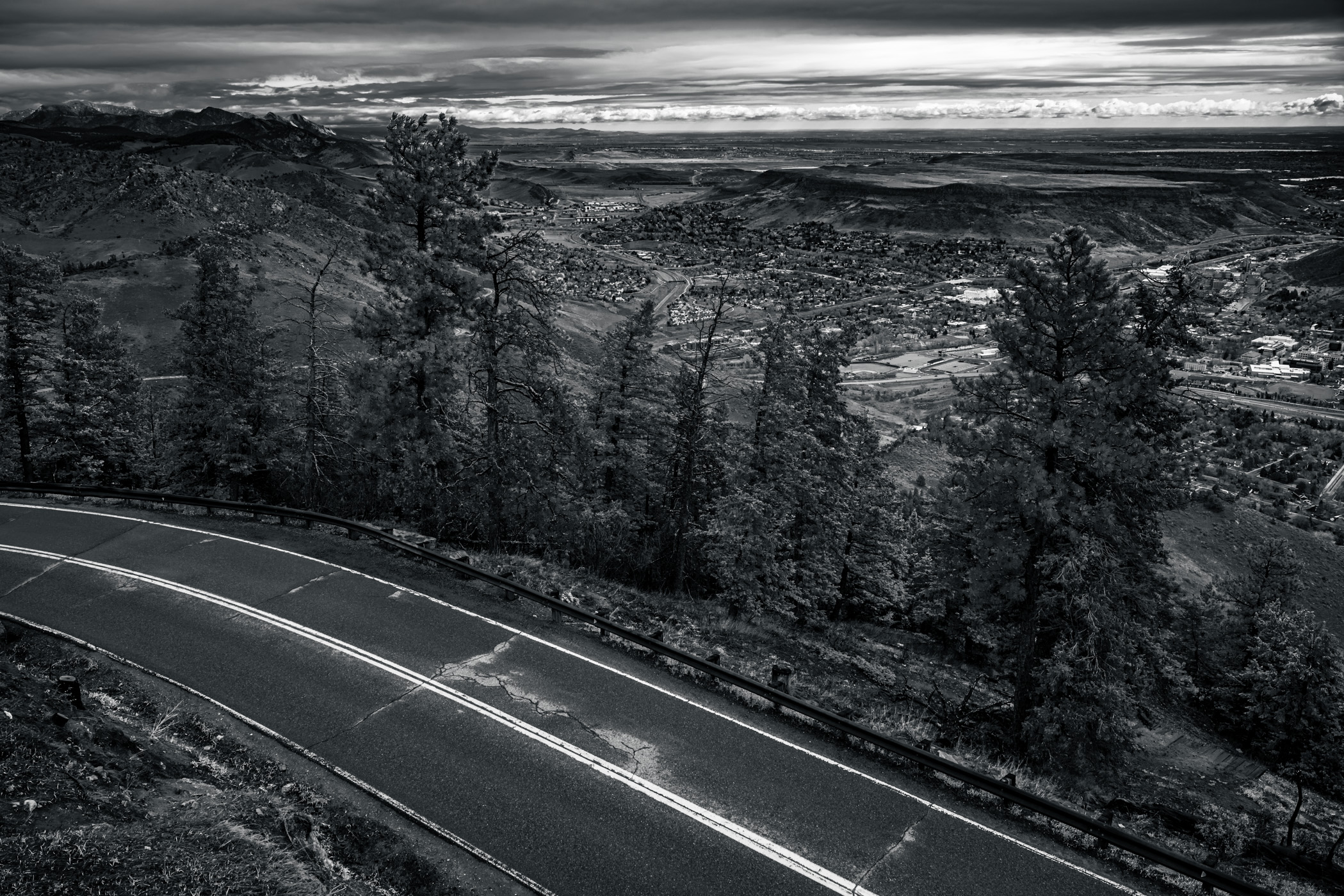 A road carves around Lookout Mountain, overlooking Golden, Colorado.