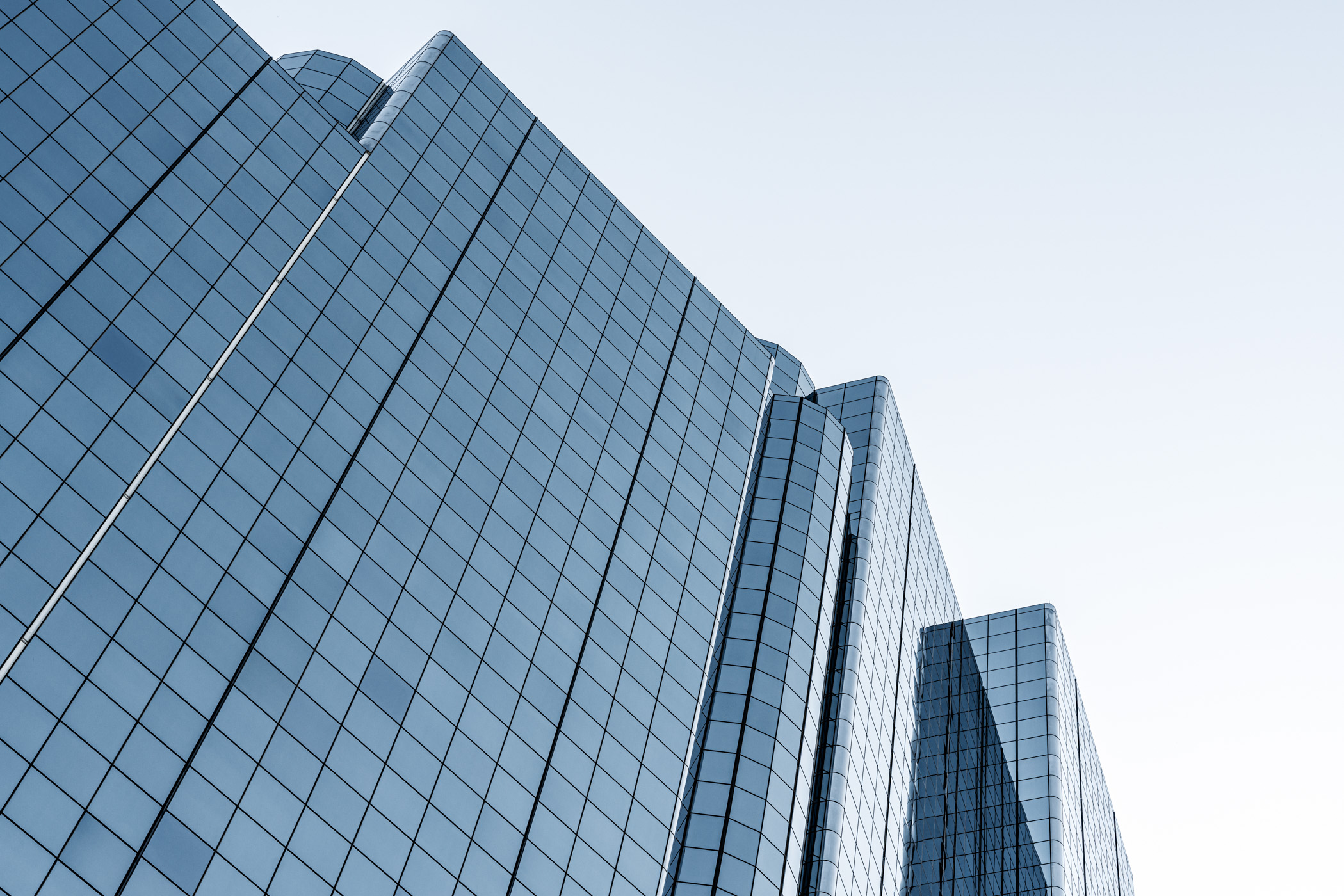This abstract view of the modern architecture of Downtown Dallas' Hyatt Regency resembles the tops of glass mountains.