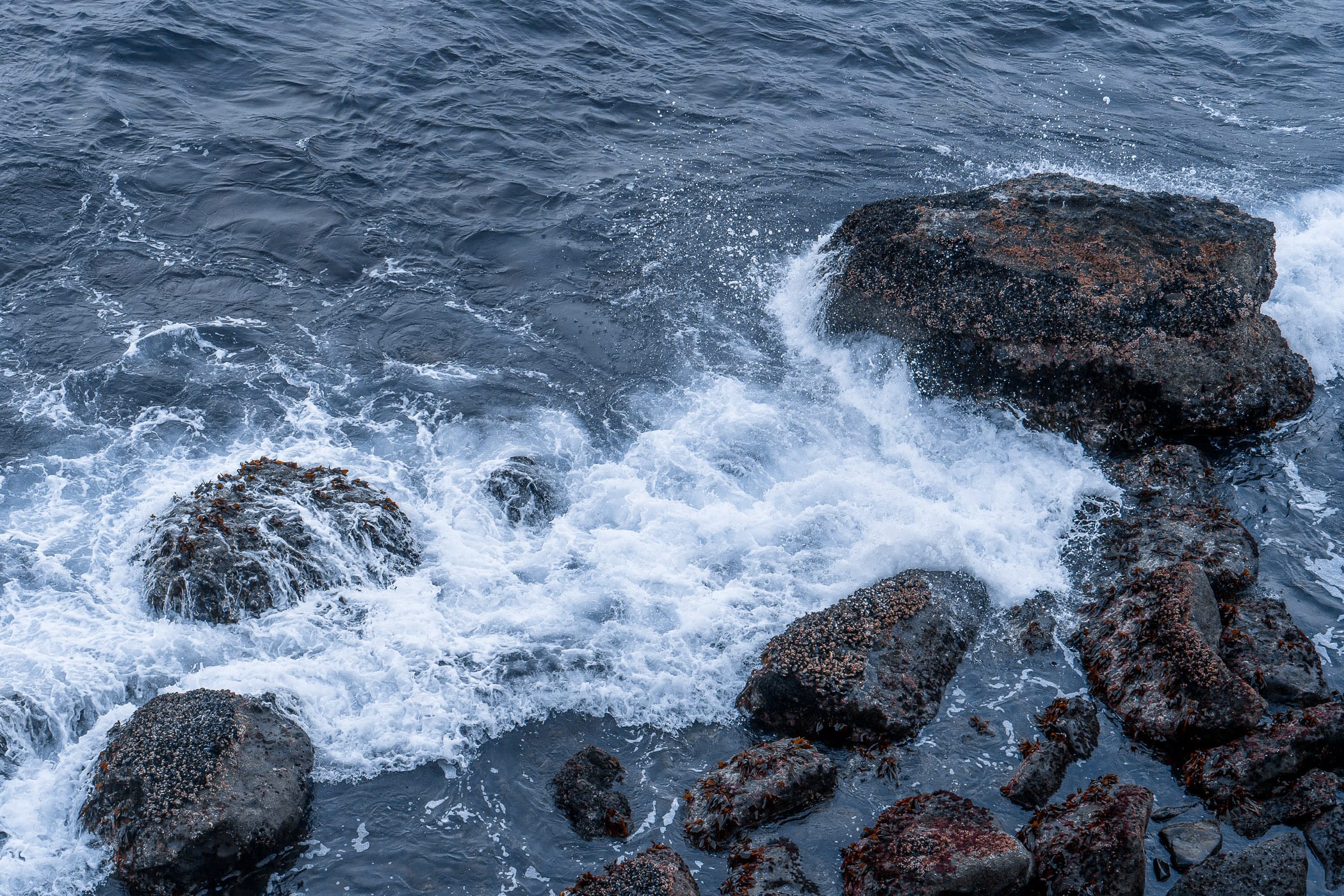 Waves wash over rocks at Boiler Bay near Depoe Bay, Oregon.