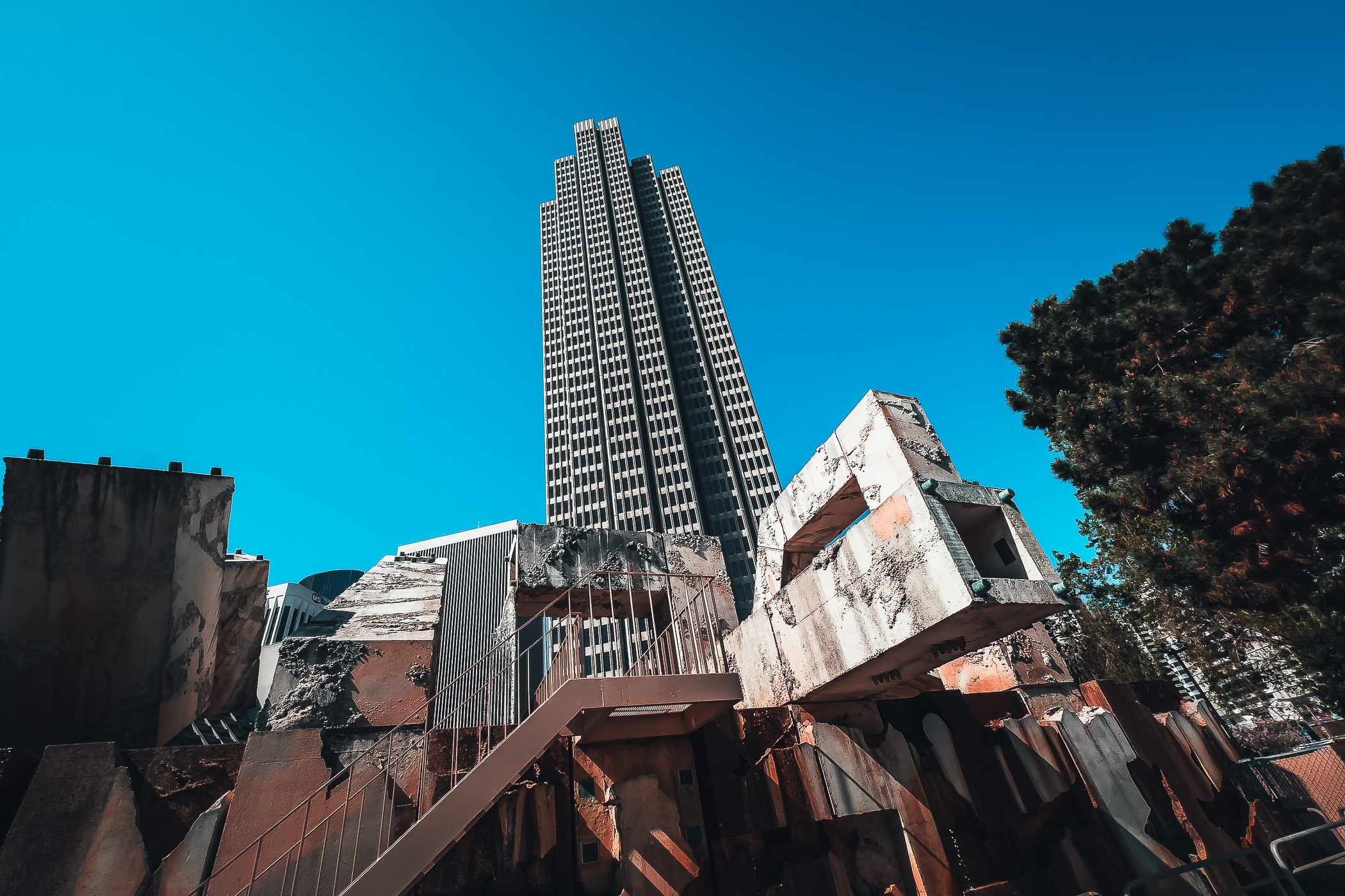 The Vaillancourt Fountain—also known as "Quebec libre!"—is overshadowed by San Francisco's Embarcadero Center.