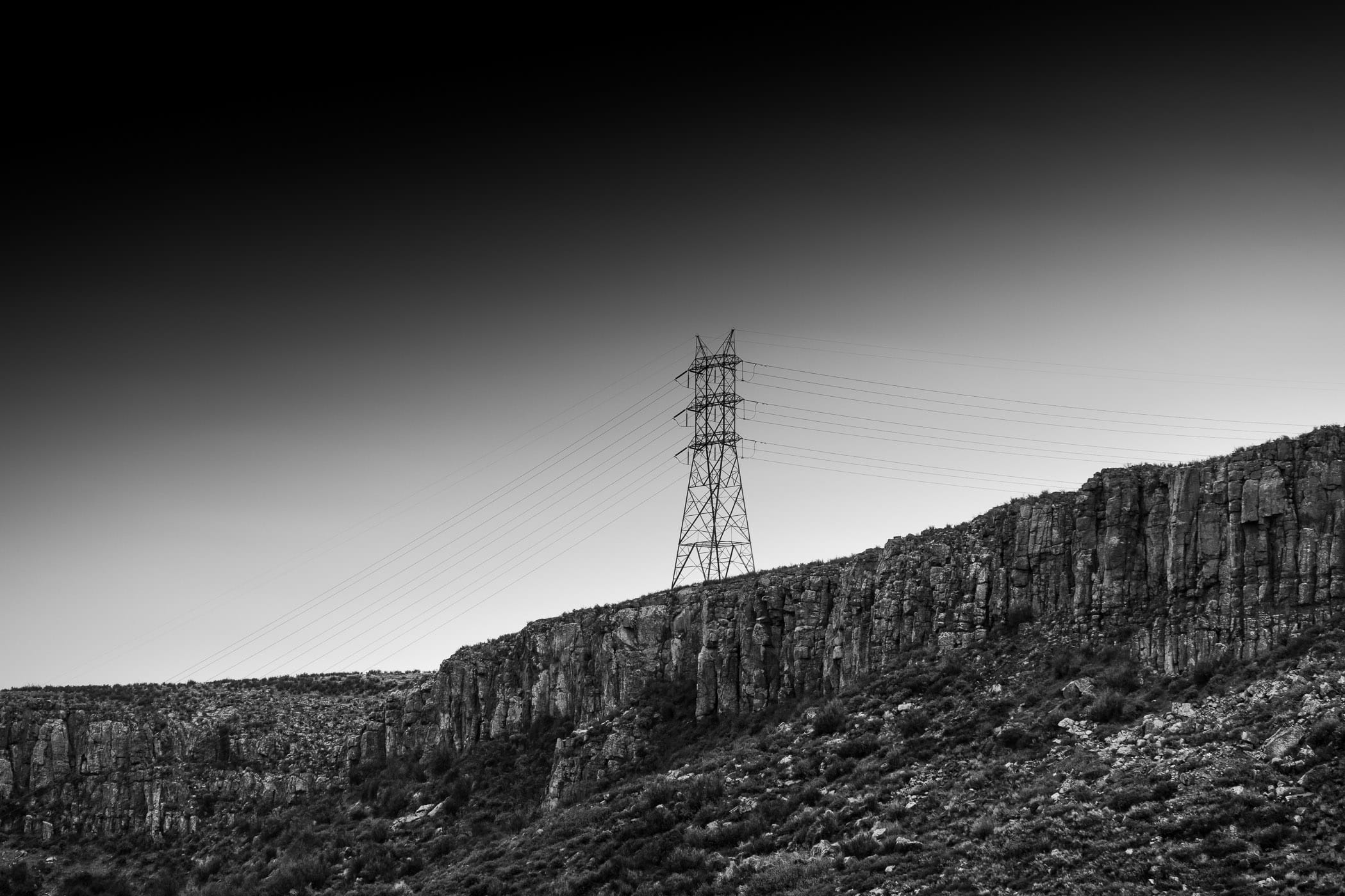 An electric pylon along the cliffs of North Table Mountain, Golden, Colorado.