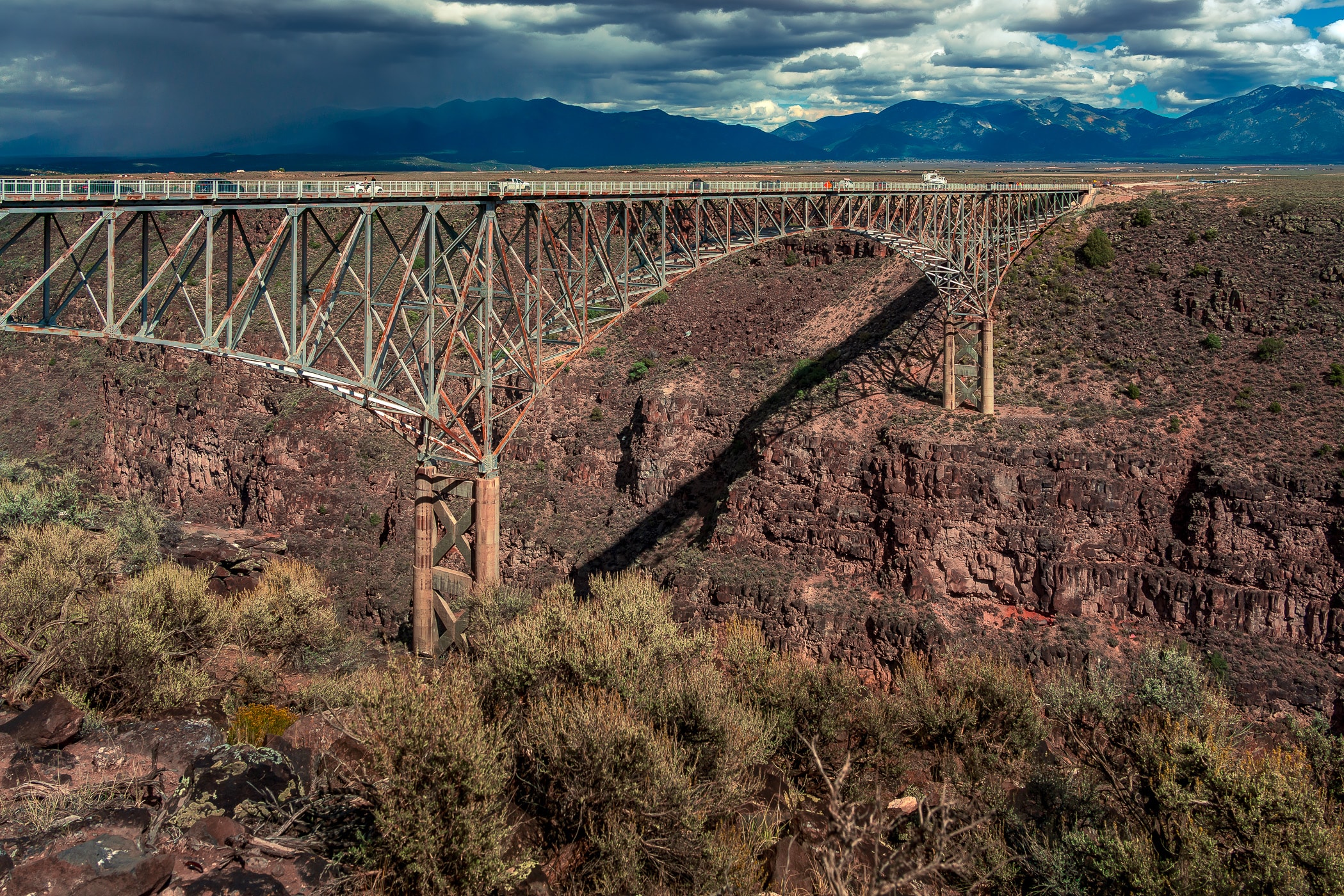 The Rio Grande Gorge Bridge arcs 600 feet above the Rio Grande in the desert near Taos, New Mexico.