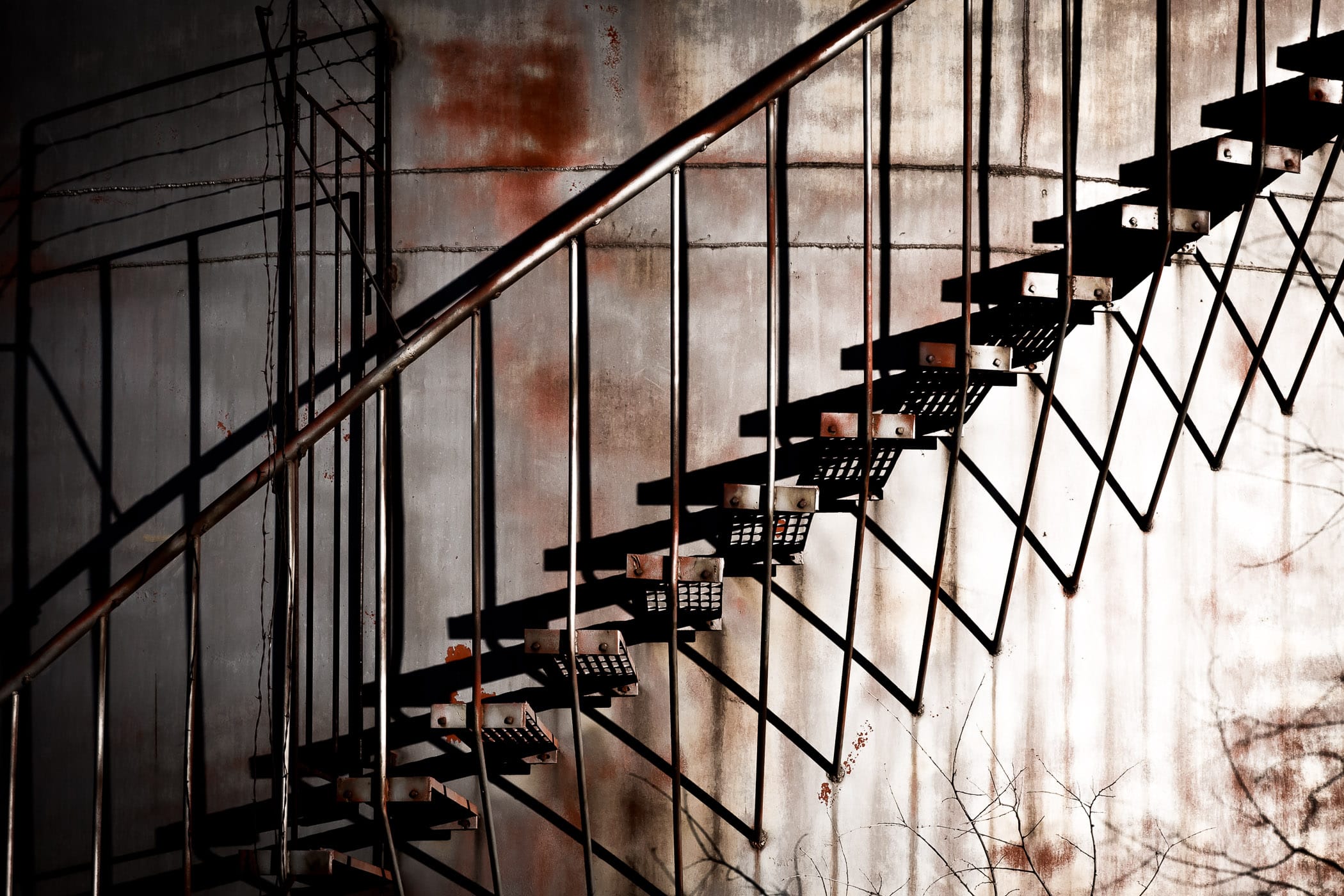 Stairs climb the outside of an oil tank near North Texas' Hagerman National Wildlife Refuge.