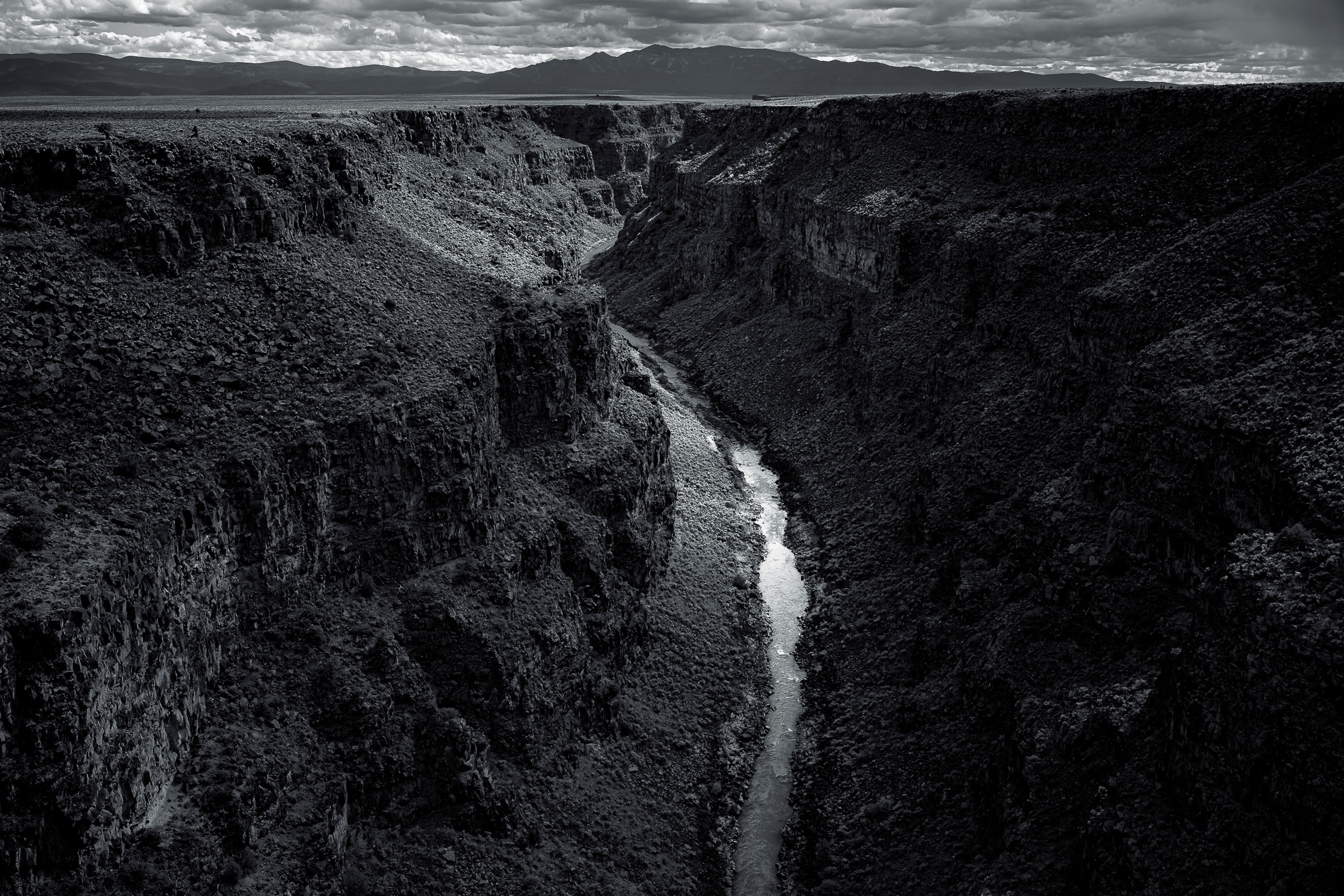 The Rio Grande flows through the desert at the Rio Grande Gorge near Taos, New Mexico,